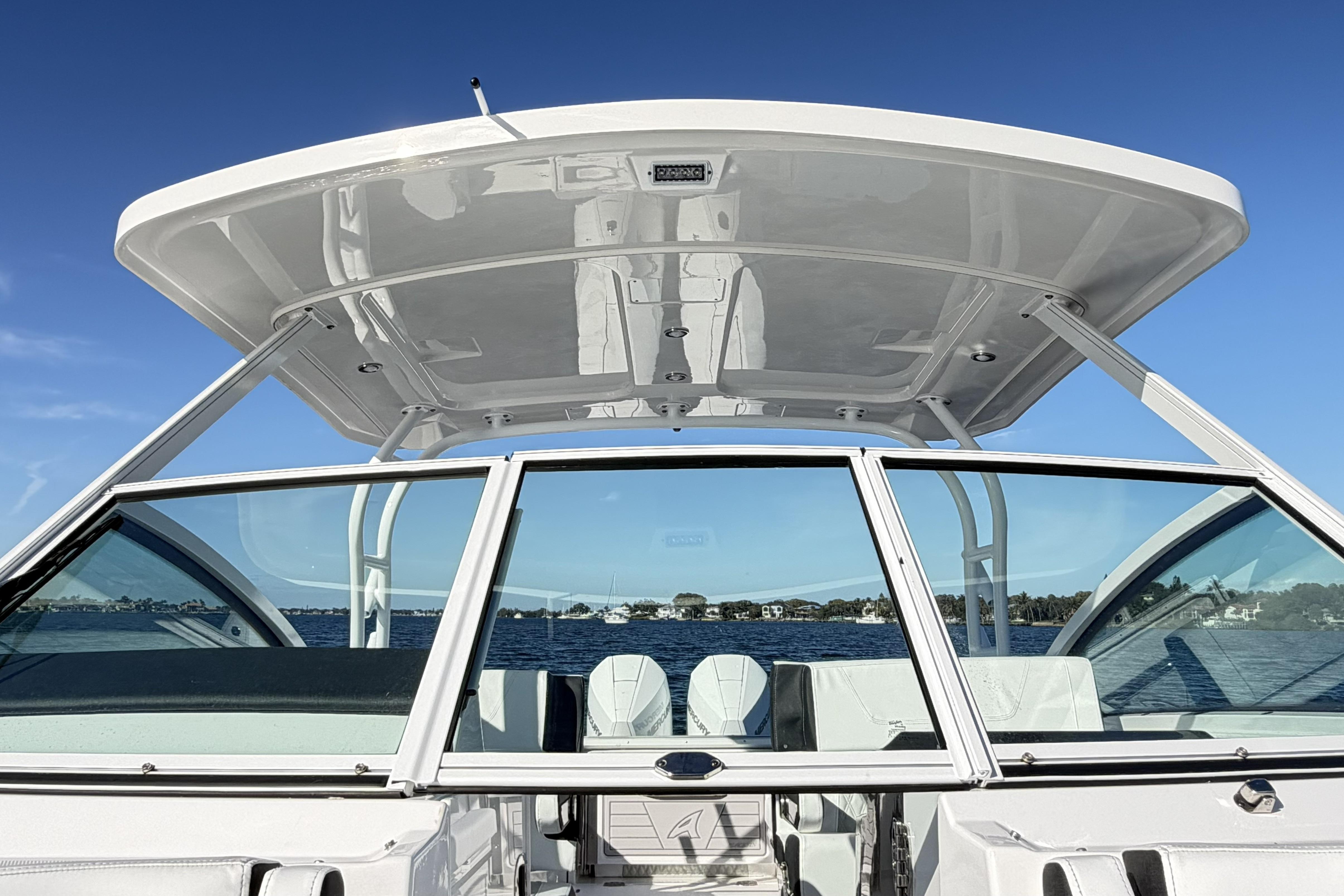 2025 Blackfin 272 DC boat with sleek design on a sunny day.