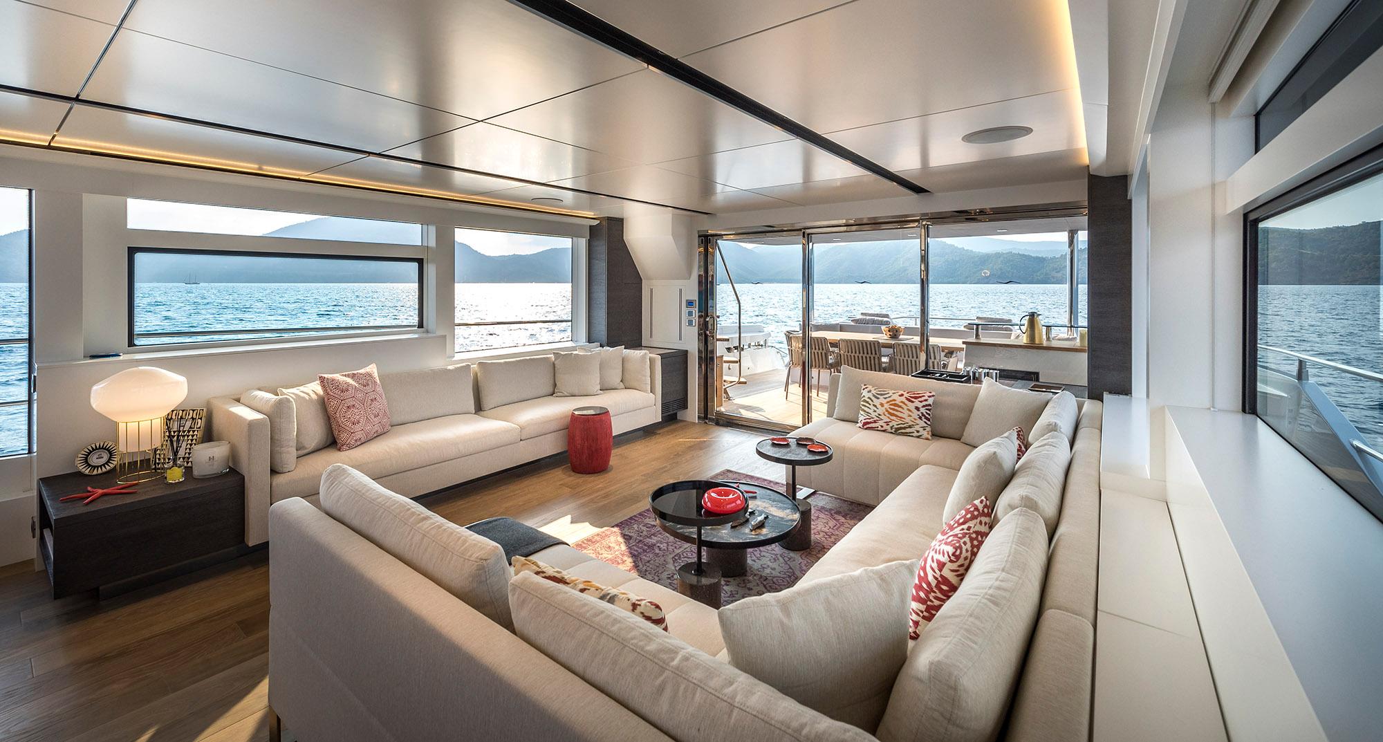 Luxurious interior of 2025 Numarine 26XP yacht with panoramic ocean views.