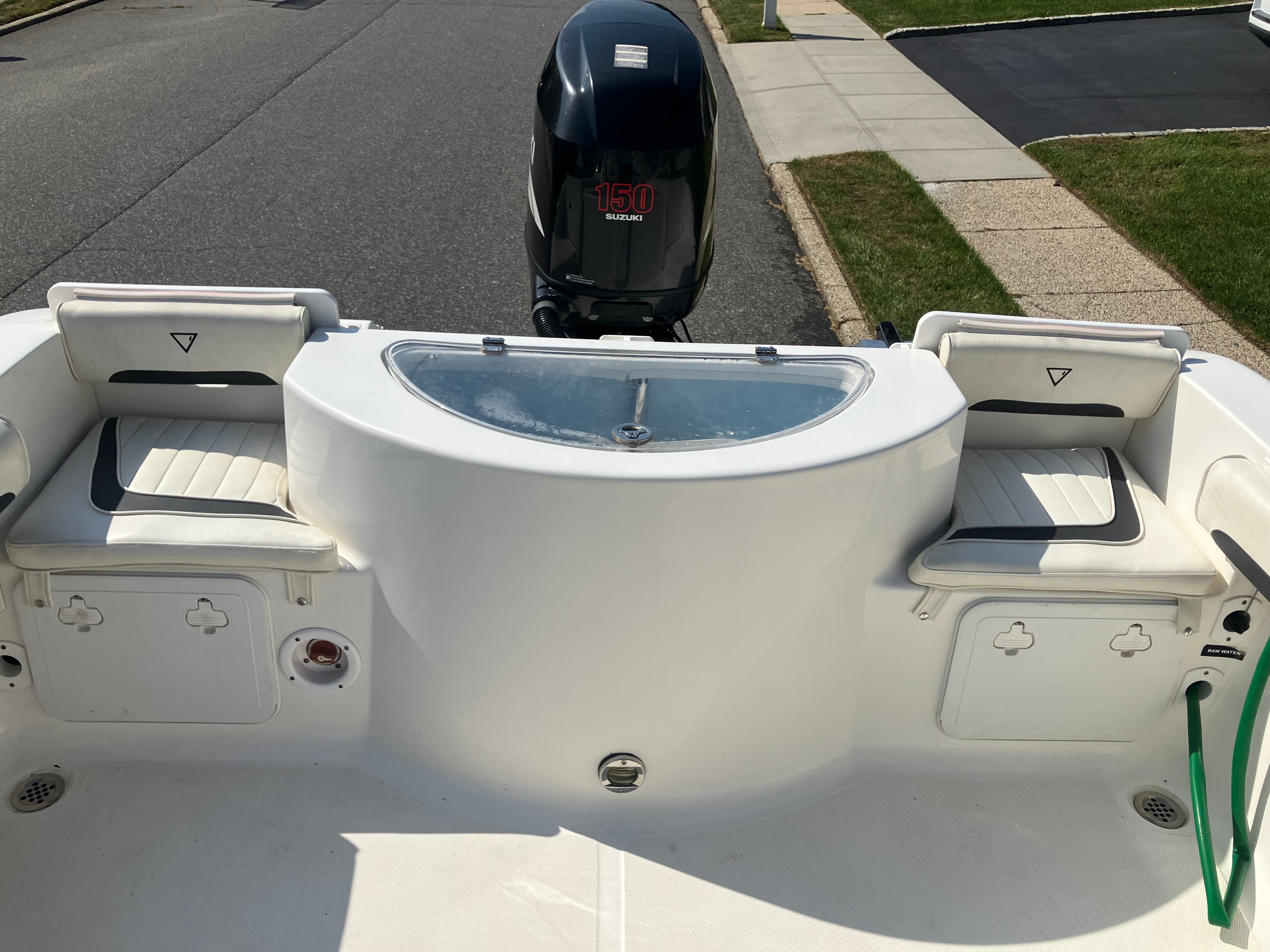 Rear view of a Custom 216wa pro boat, 2010 model, with Suzuki 150 engine.
