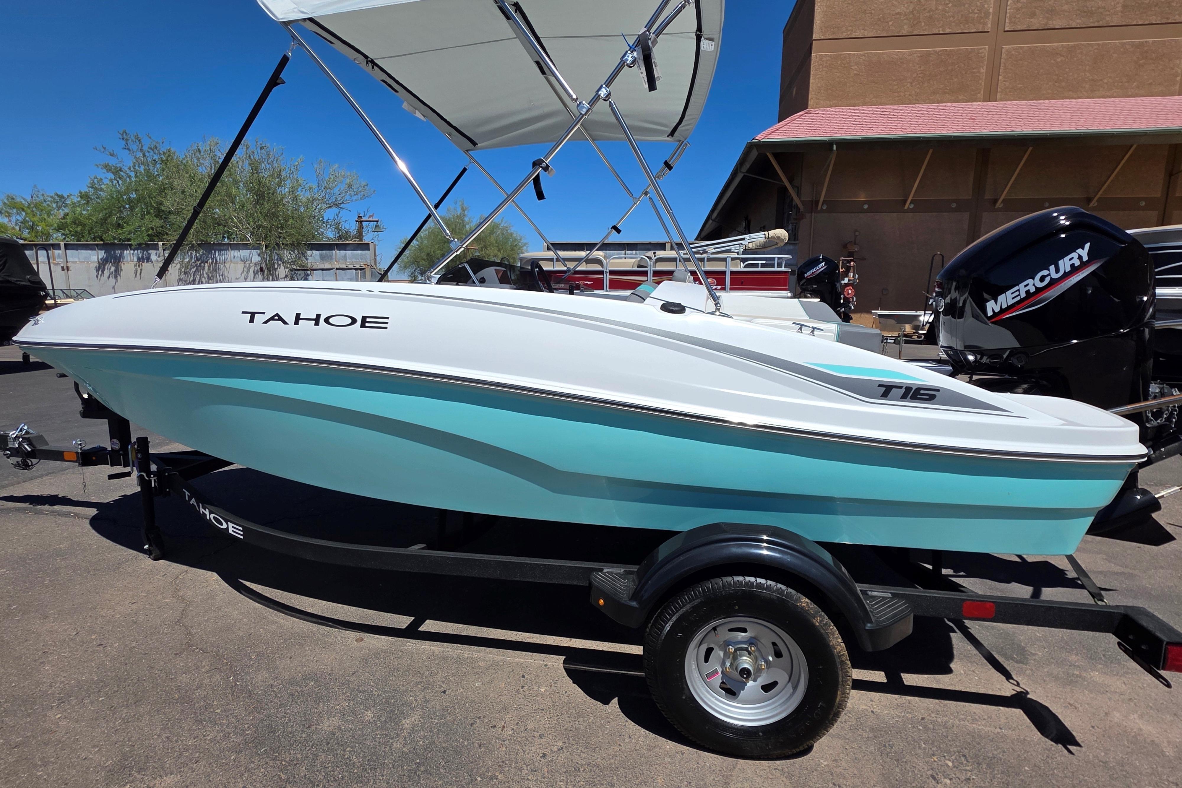 2026 Tahoe T16 boat with canopy and Mercury engine on trailer.