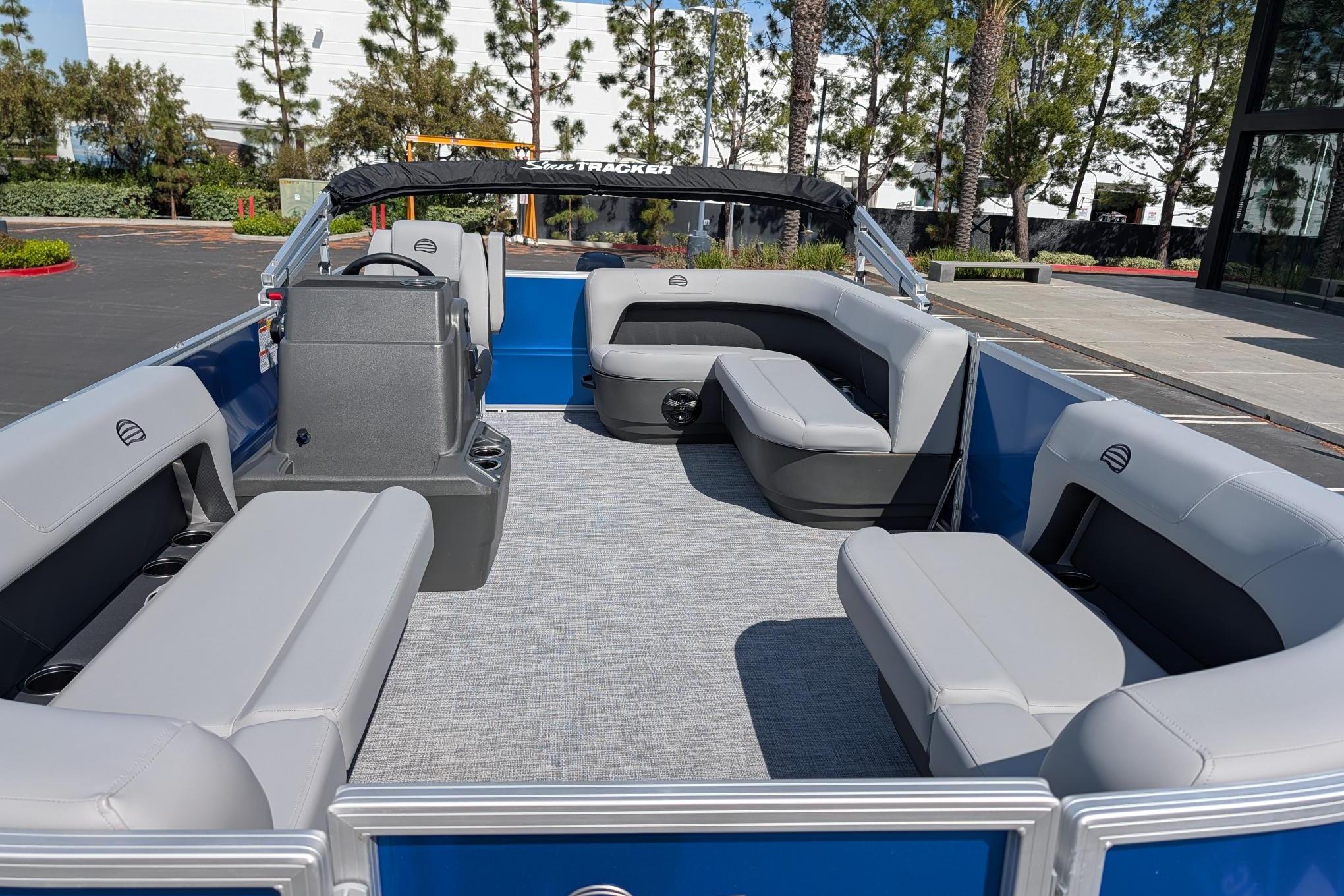 2026 Sun Tracker Party Barge 16 DLX pontoon boat with spacious seating and modern design.