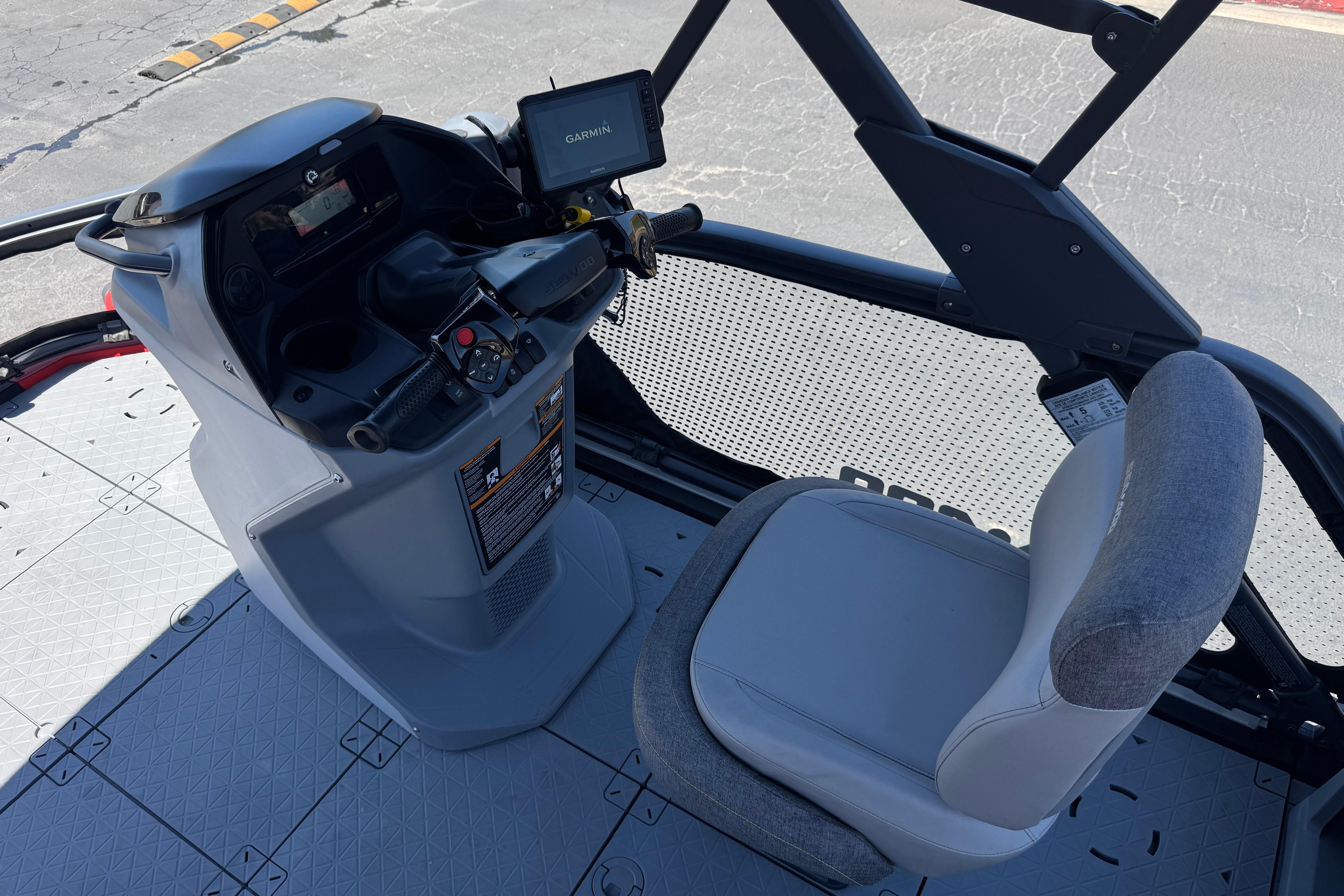 2024 Sea-Doo Switch Compact dashboard and seat with Garmin navigation system.