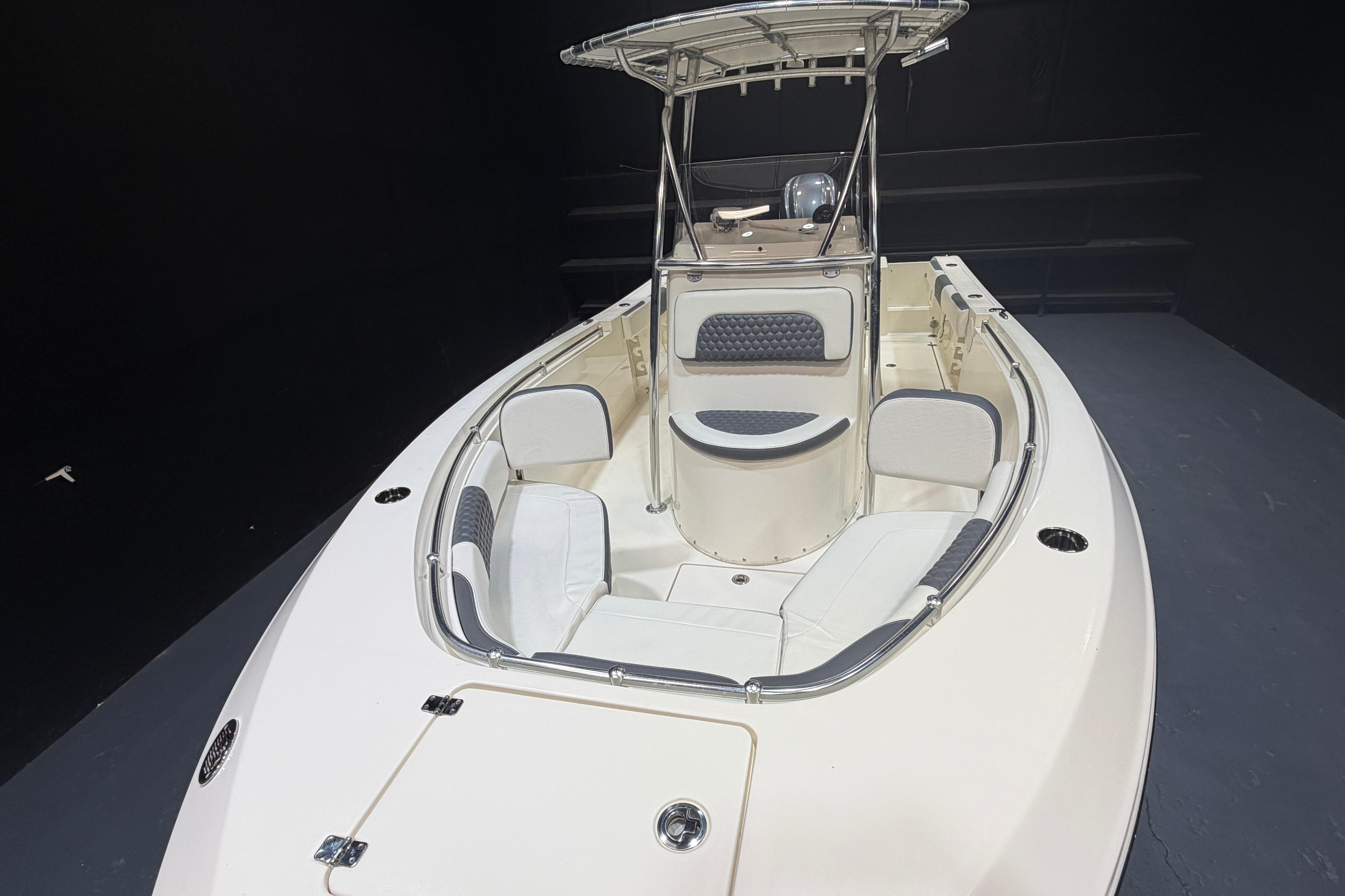 2023 Cobia 237 Center Console boat with spacious seating and sleek design.