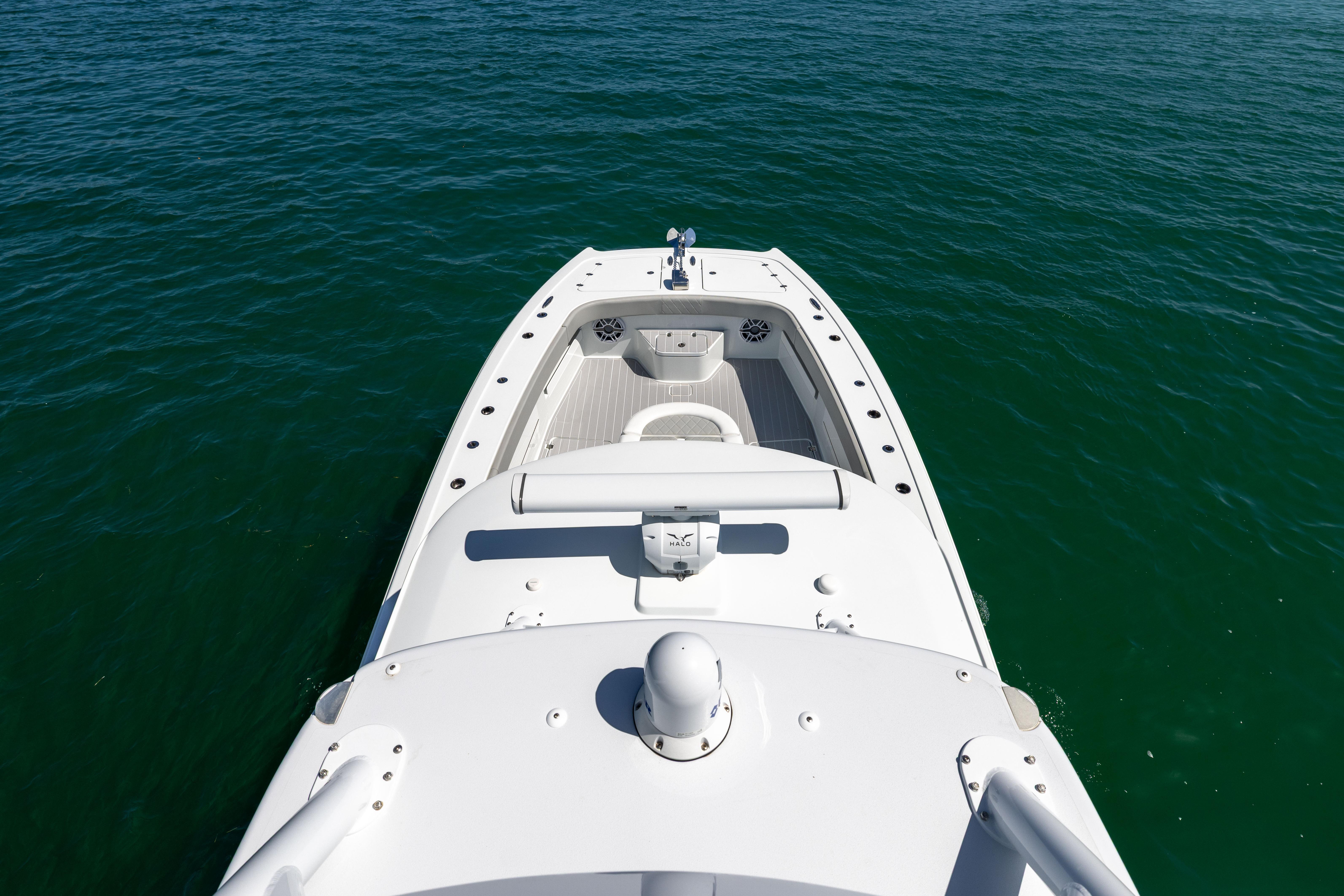 2024 Freeman 43 boat on calm water, showcasing sleek design and spacious deck.