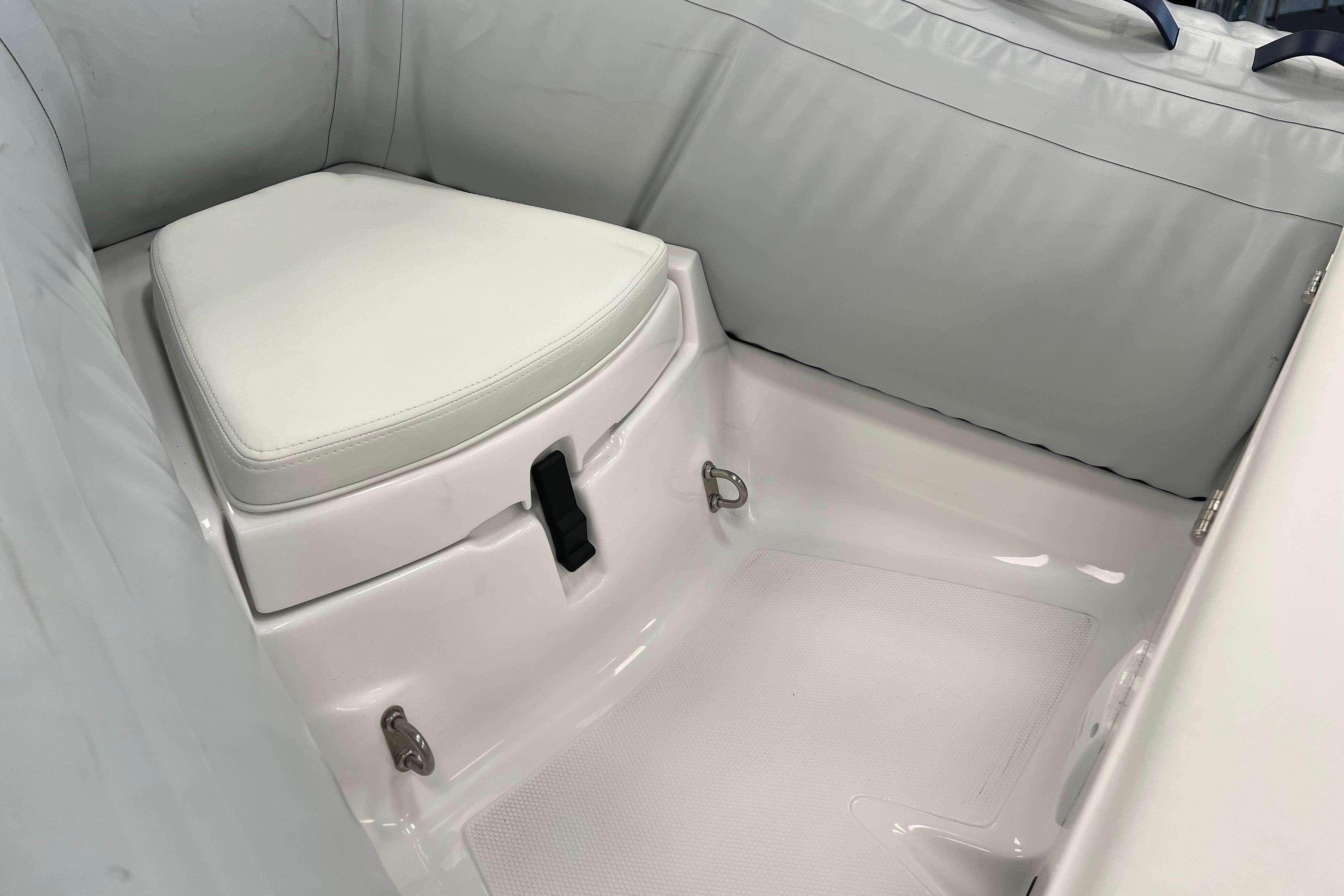 2023 AB Inflatables Mares 12 VSX interior seating with white cushion and sleek design.
