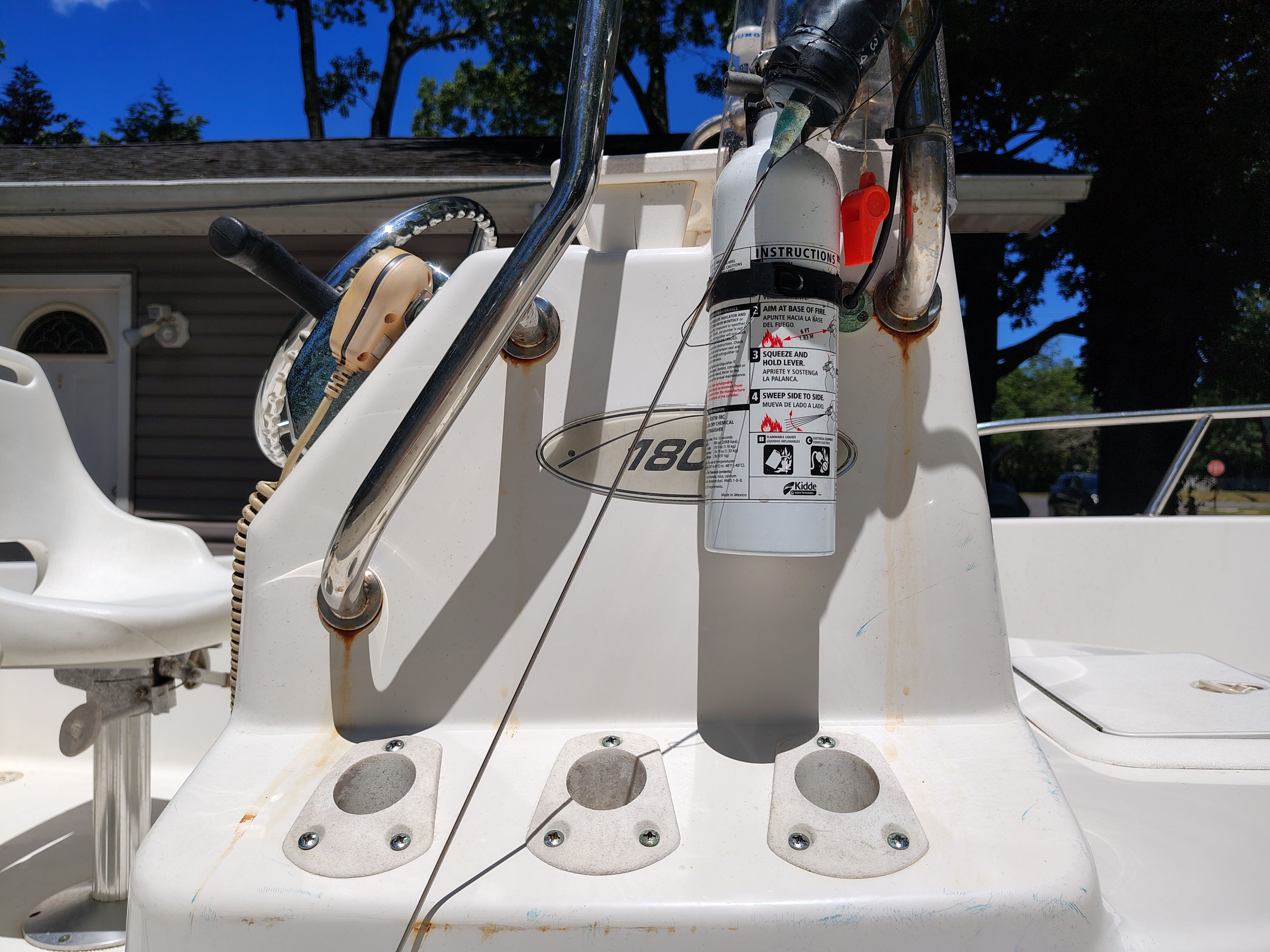 Close-up of the helm on a 2003 Sea Pro 180 Center Console boat.