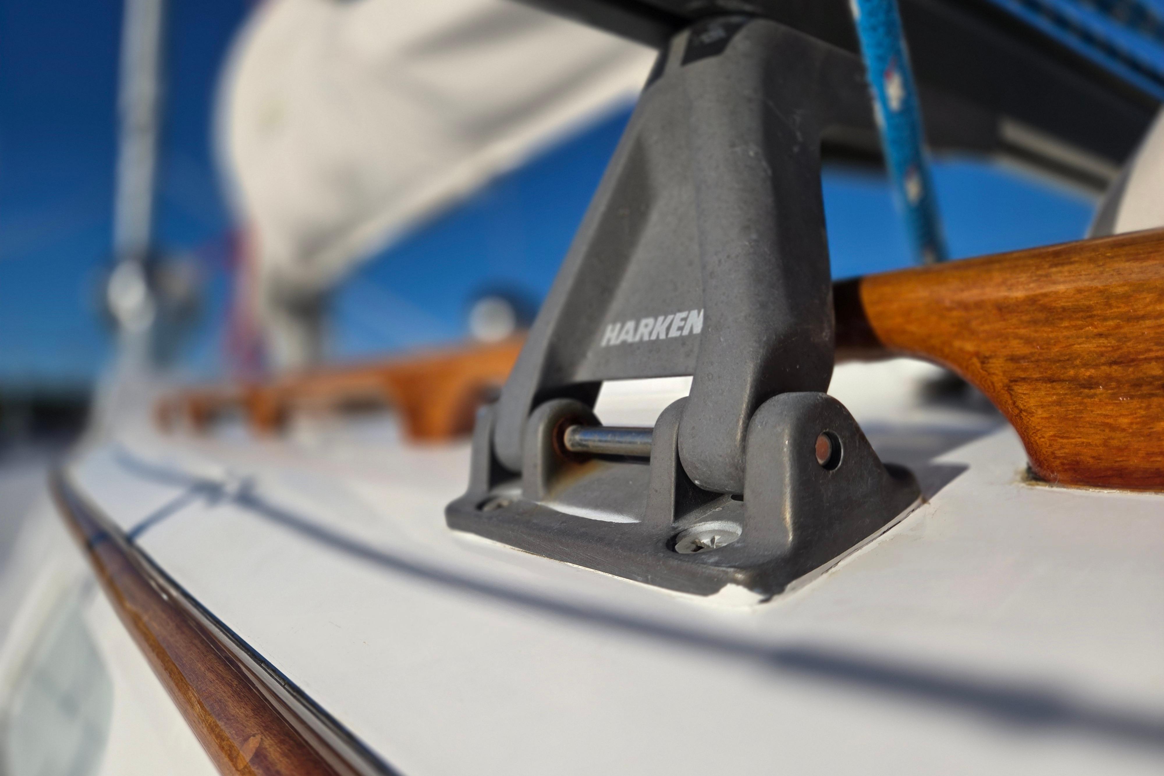 Close-up of a 1970 Hinckley Bermuda 40 sailboat deck with Harken hardware.