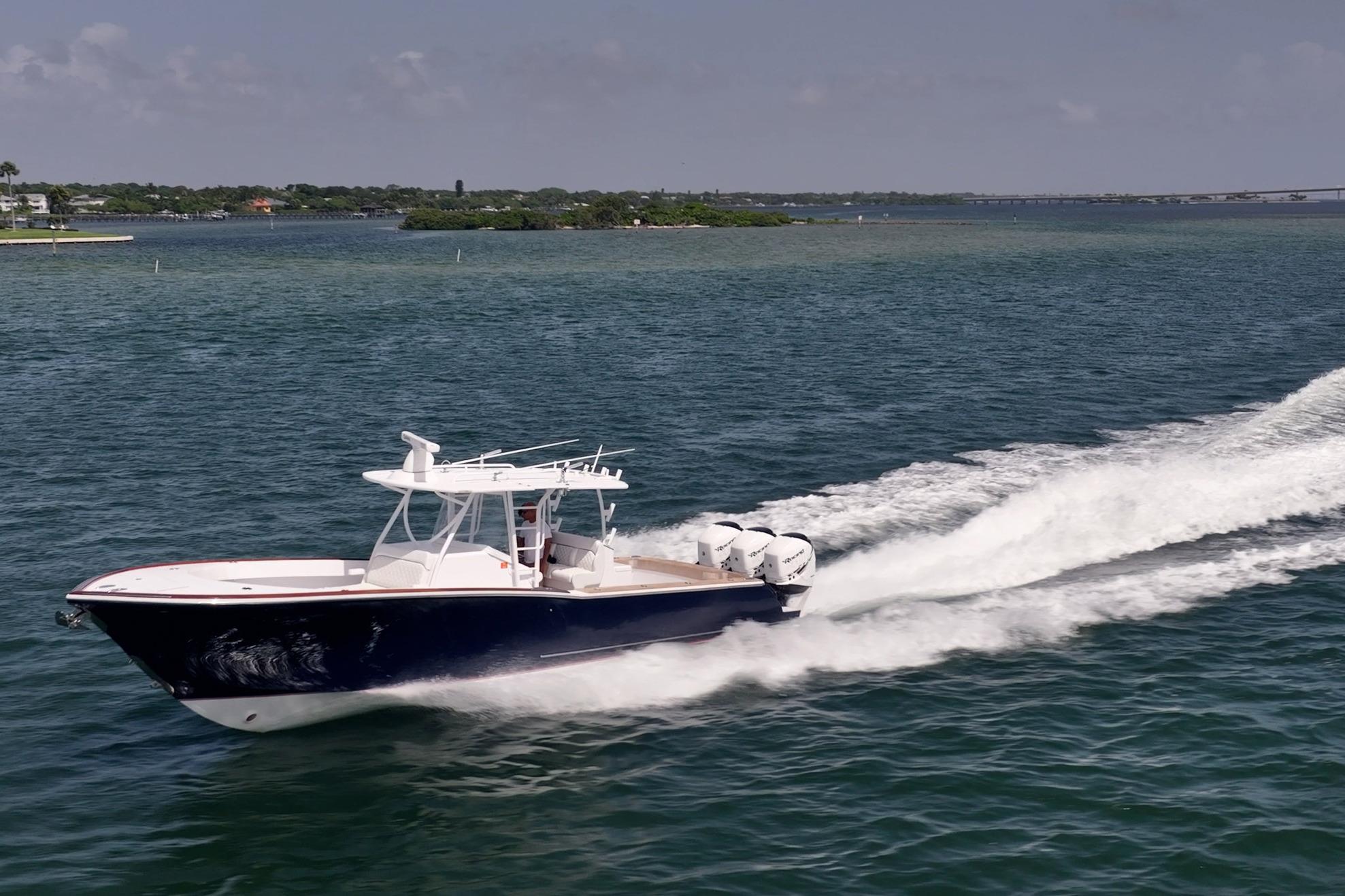 2018 Bonadeo 37 WACC boat cruising on open water, creating a wake.