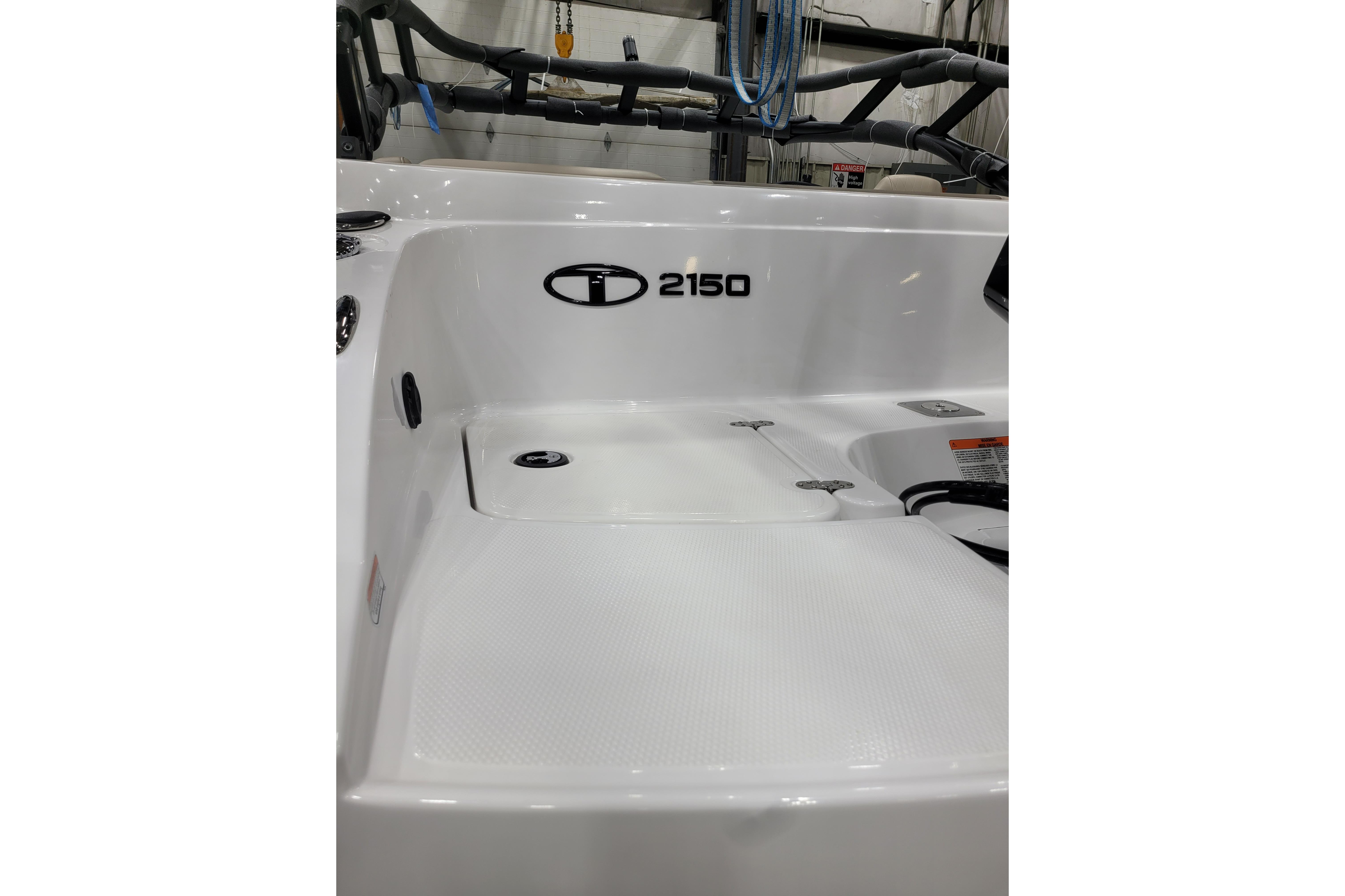 2026 Tahoe 2150 boat interior, featuring sleek white design and modern fittings.