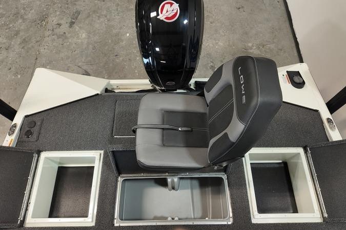 2024 Lowe Stinger 188 boat interior with seating and storage compartments.