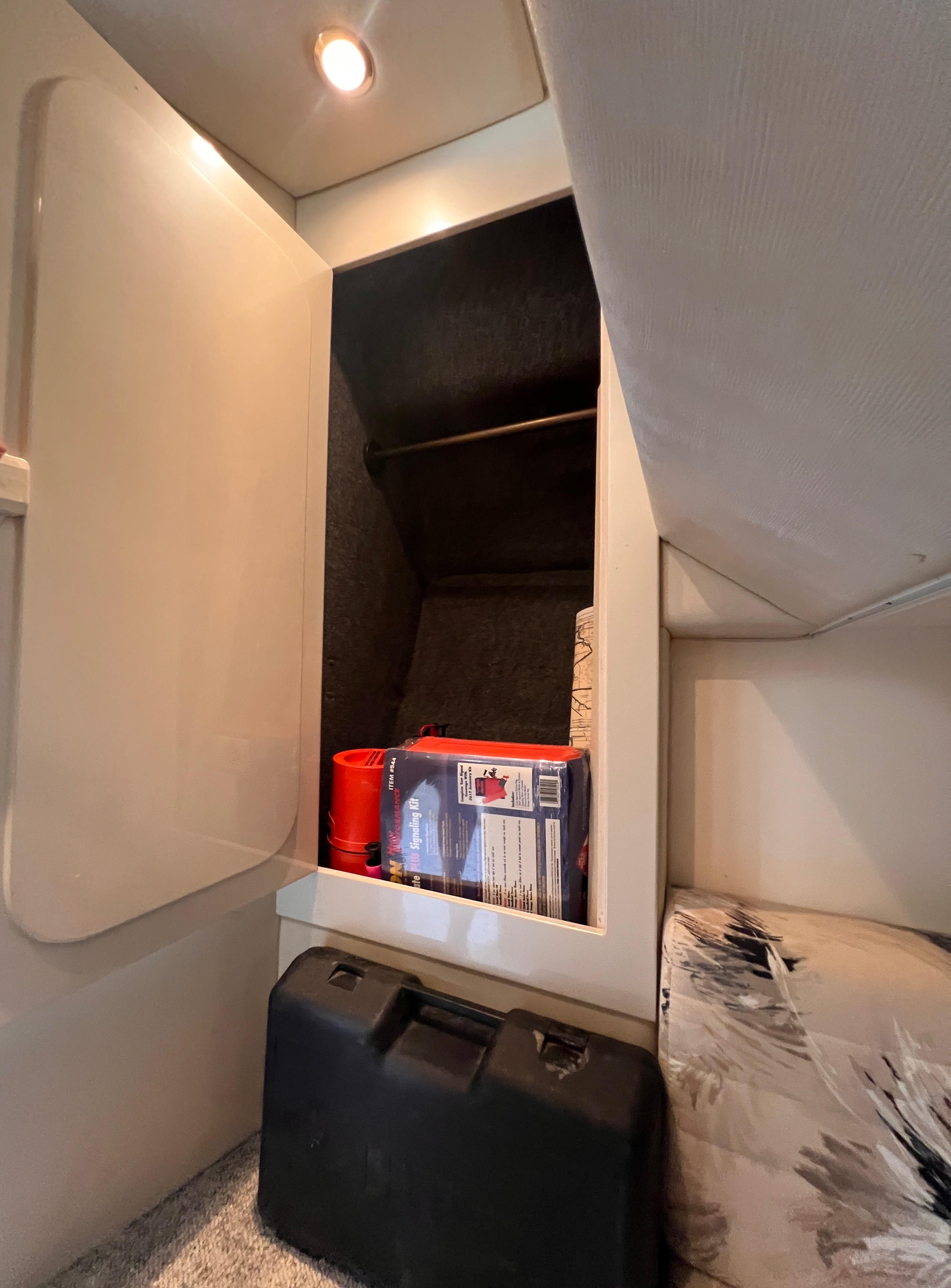 Interior storage space in a 2000 Wellcraft 45 Excalibur boat cabin.