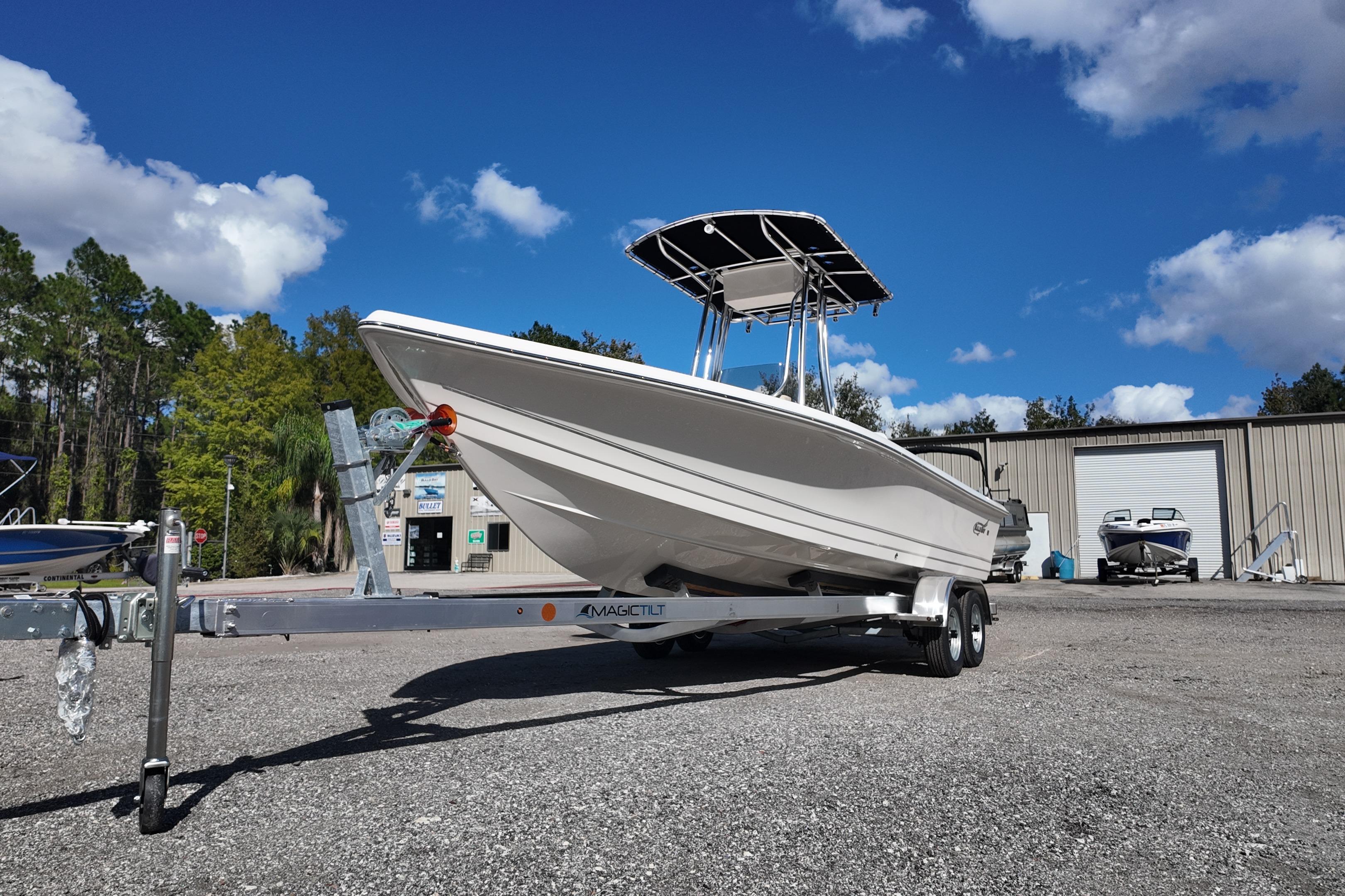 2026 Bulls Bay 2200 boat on trailer under clear blue sky.