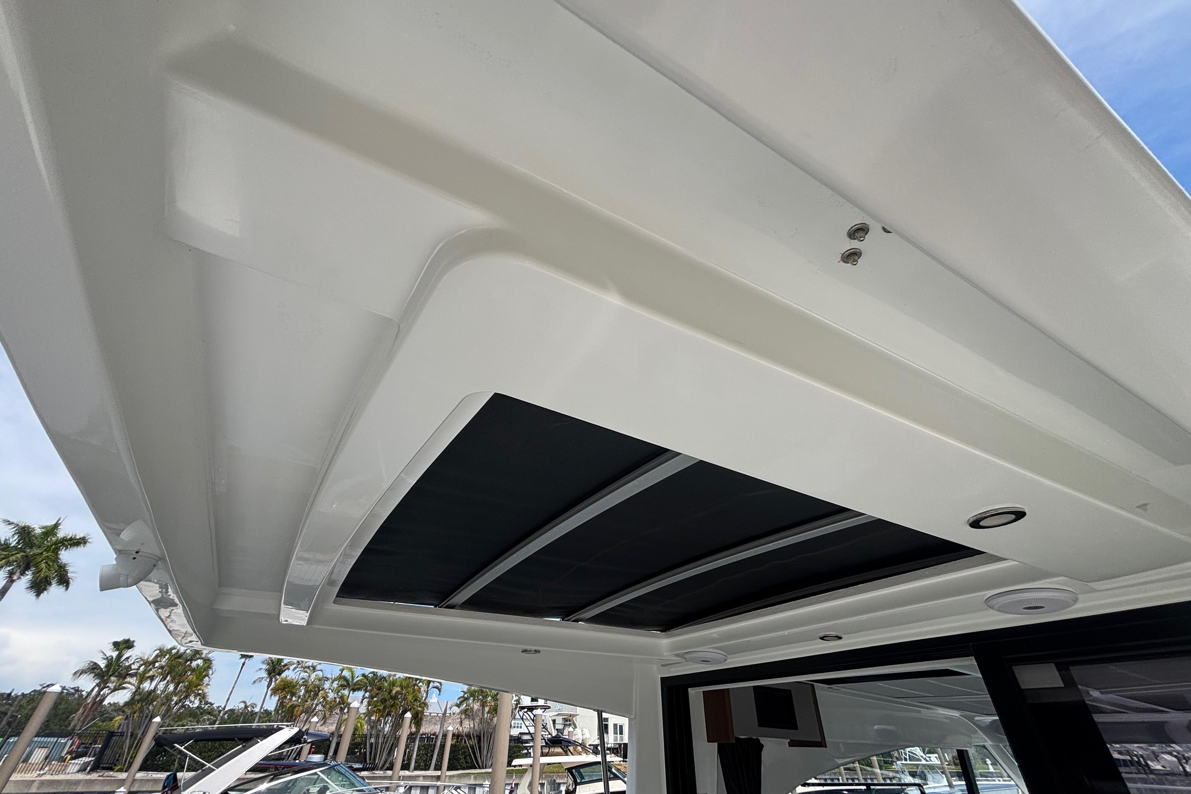 2024 Beneteau Antares 11 boat roof detail with sleek design and integrated lighting.