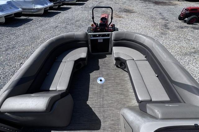 2021 Bennington 23 SSRX pontoon boat interior with gray seating and steering console.