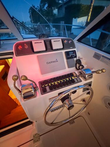 Helm of 2006 Tiara Yachts 3200 Open with Garmin navigation system.