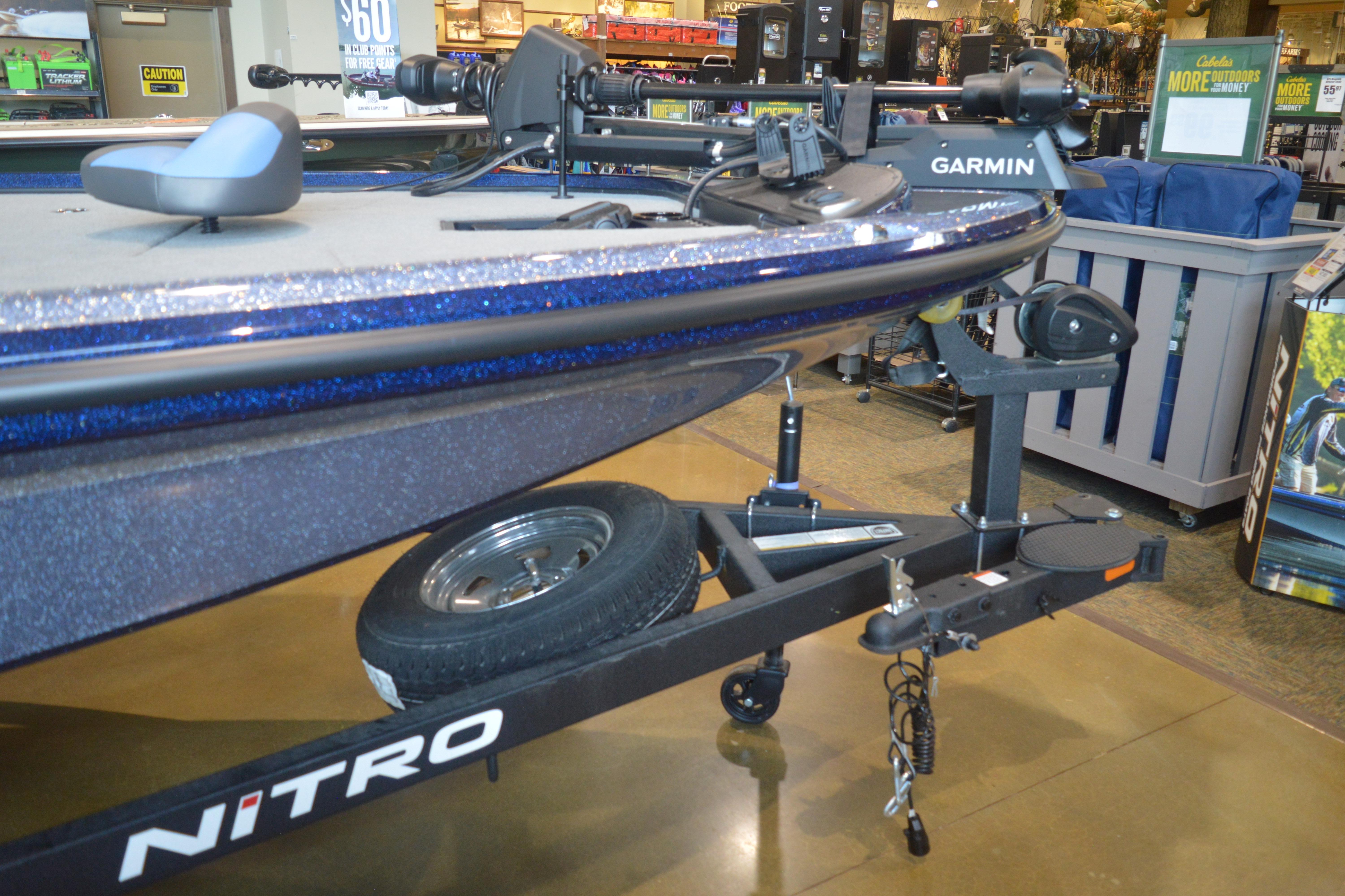 Nitro Z18 Pro 2026 boat with Garmin equipment on display in a showroom.