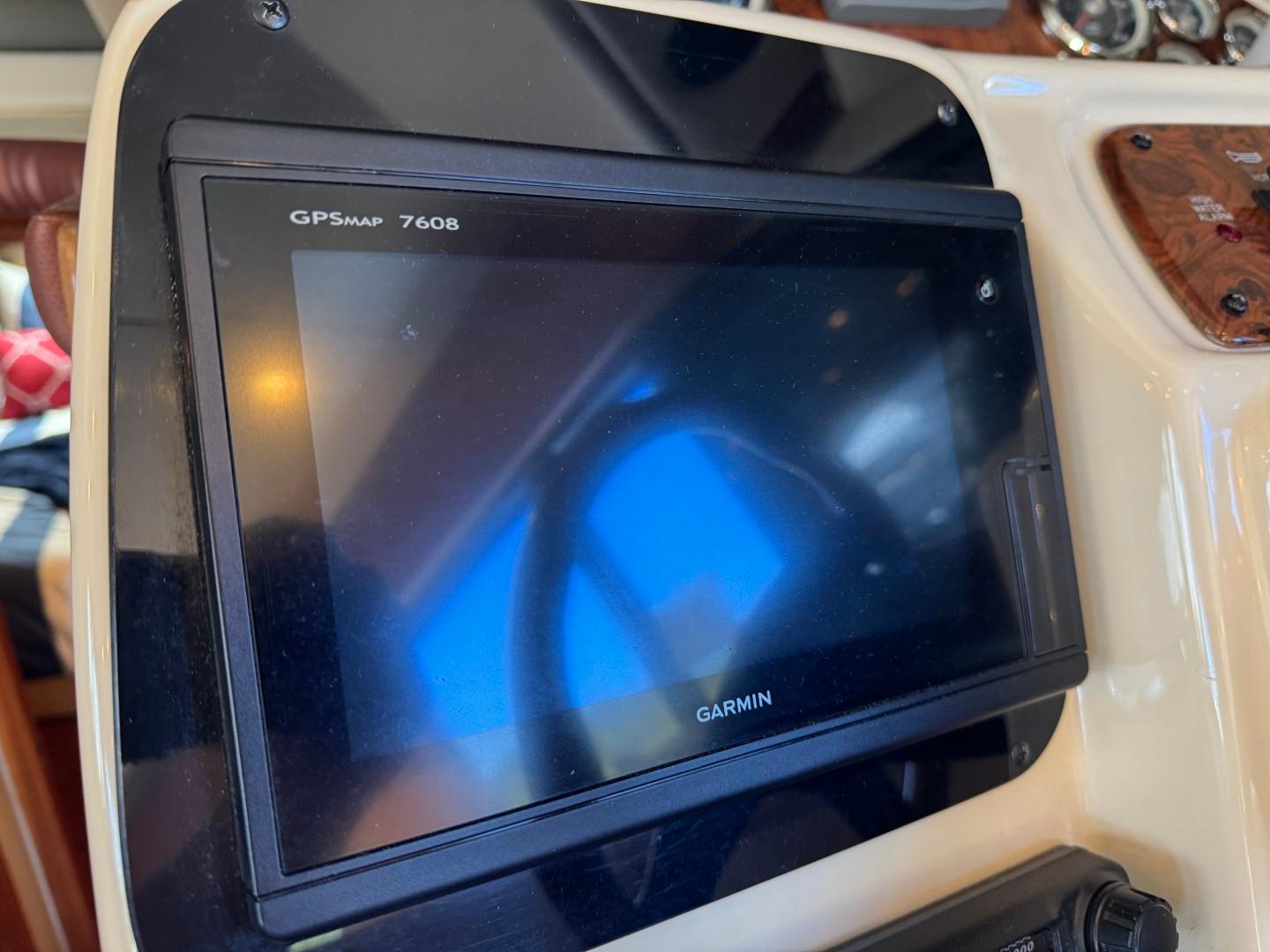 Garmin GPSMAP 7608 on 2003 Meridian 381 Sedan dashboard.