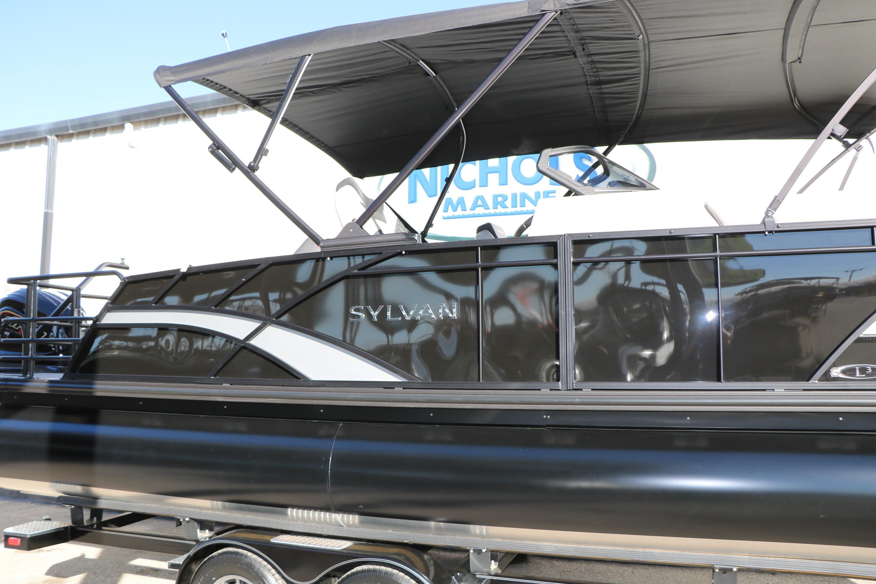 2026 Sylvan L3 CLZ DH pontoon boat with sleek black design and canopy.