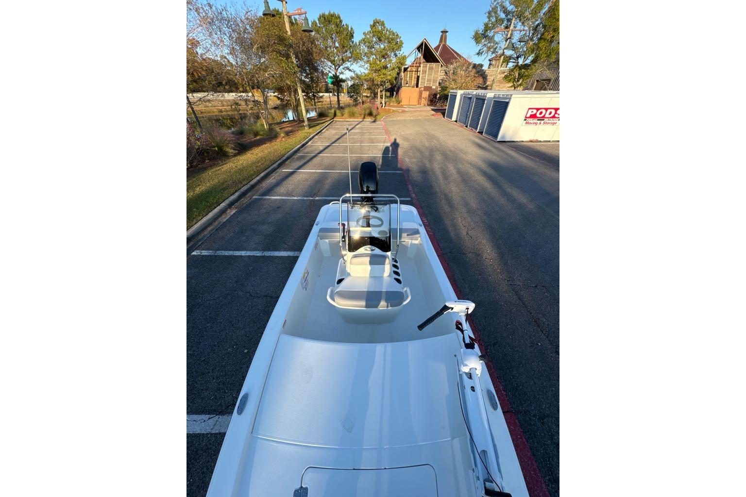 2026 Mako Pro Skiff 13 CC boat parked on a sunny day.