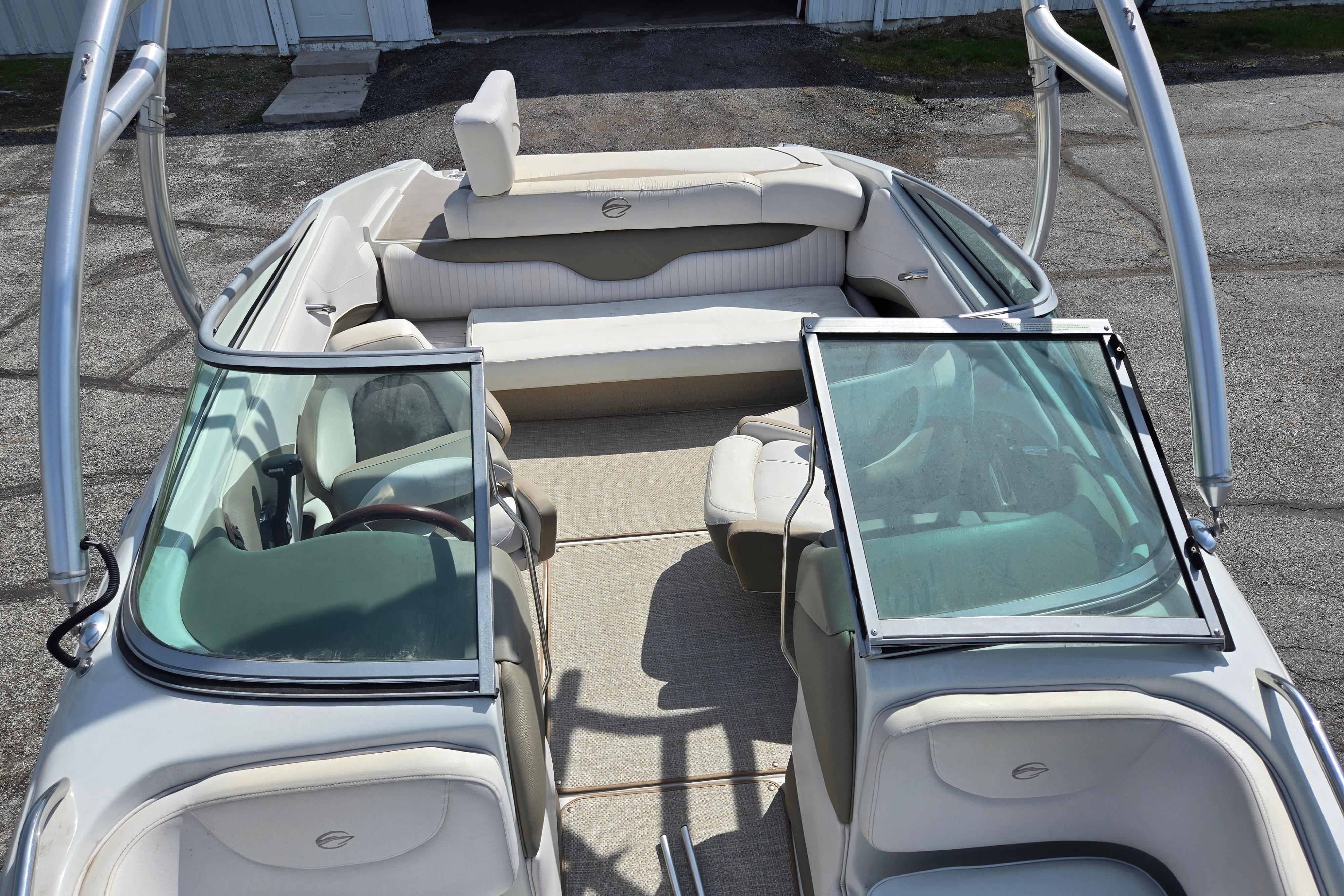 2014 Crownline 21 SS boat interior with open windshield and seating.