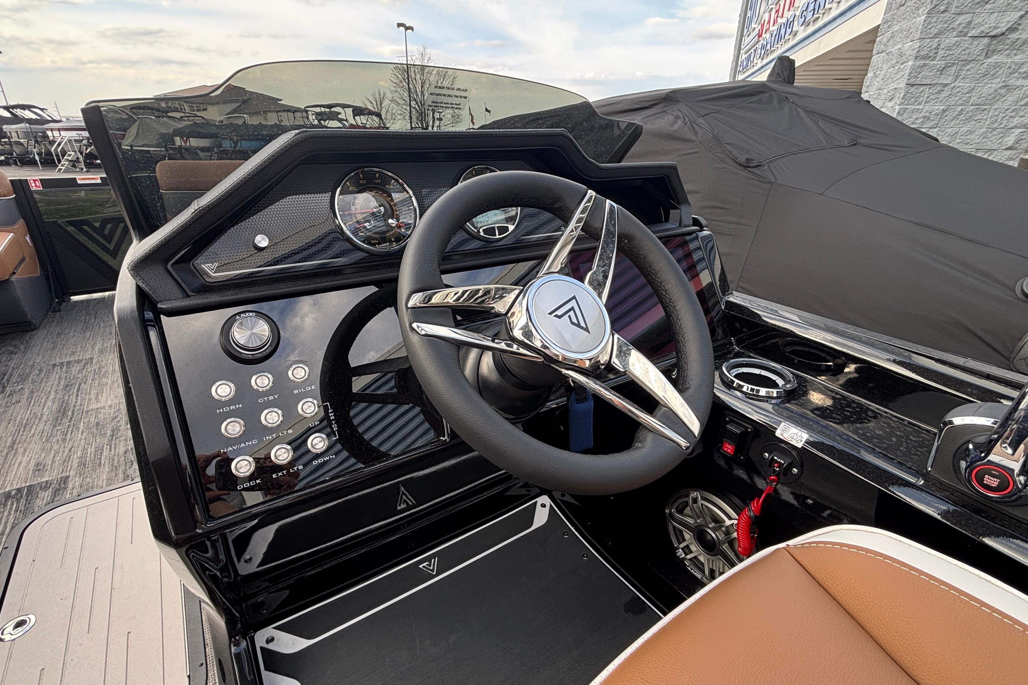 2026 Viaggio Diamante U 26 boat dashboard with steering wheel and control panel.