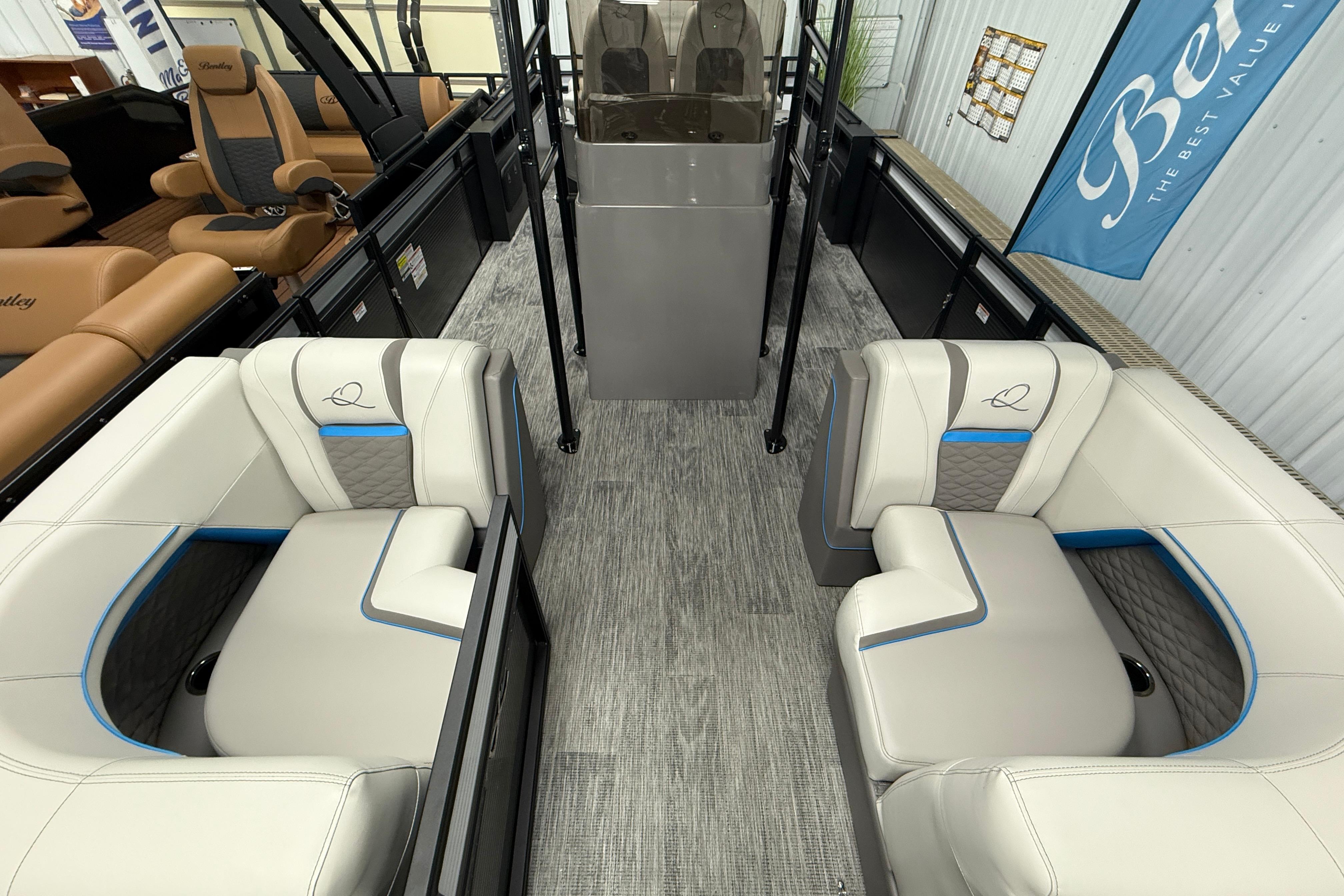 Interior of 2026 Qwest M-Class 22 Pro Sport boat with luxurious seating and modern design.