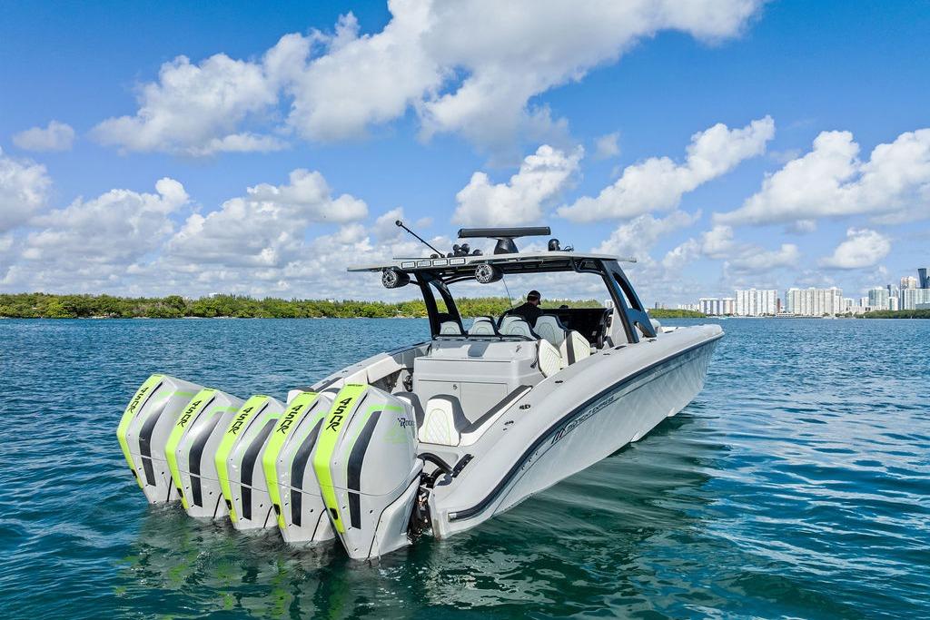 2022 Midnight Express 43' Solstice boat with quad engines on open water.
