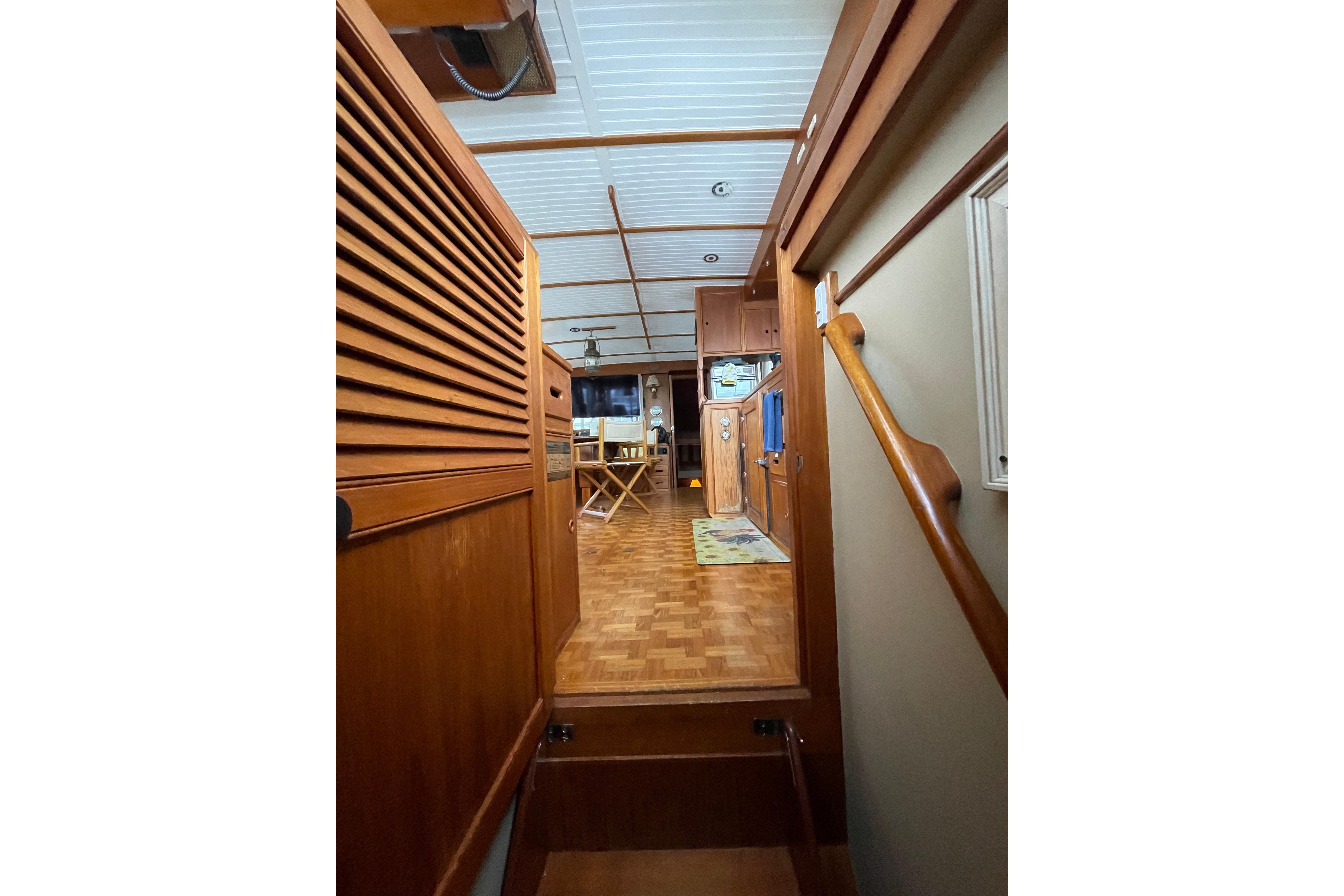 Interior view of 1983 Grand Banks 49 Classic yacht with wooden finishes.