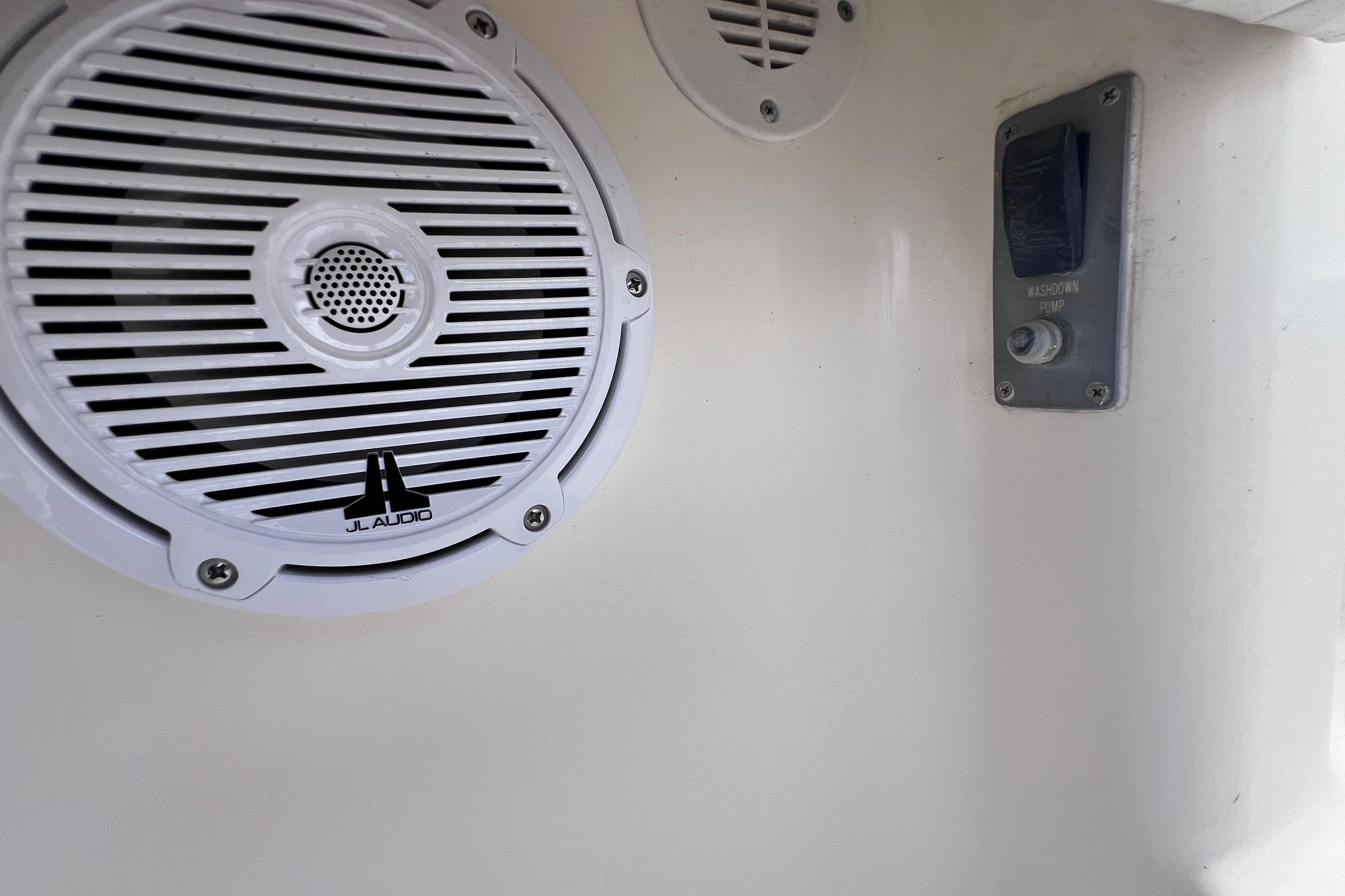 JL Audio speaker and washdown pump switch on 2004 Pursuit 2870 Walkaround boat.