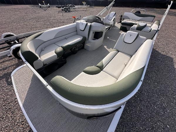 2025 Tahoe Pontoon LTZ Cruise Rear Bench with spacious seating on gravel surface.