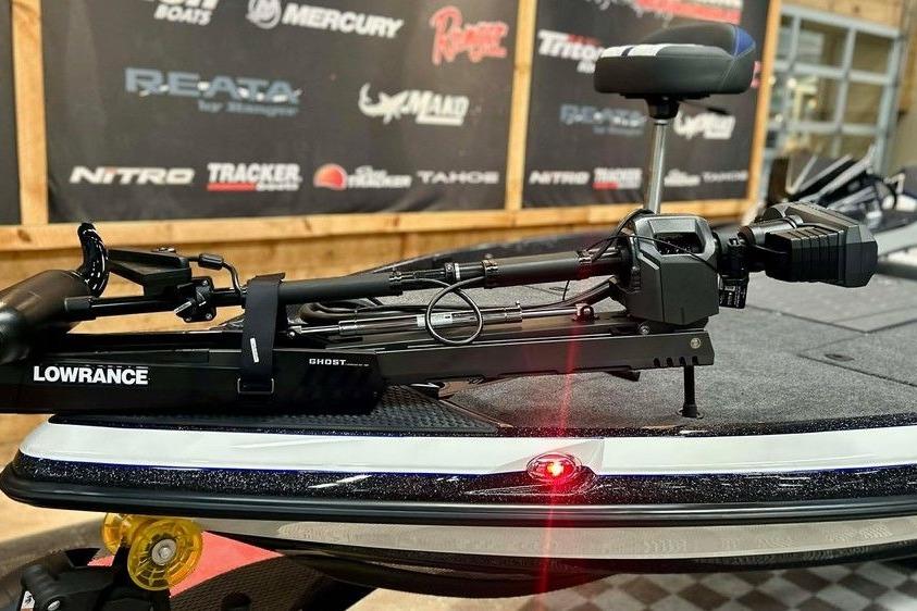 2026 Ranger Z521R Cup-Equipped boat with Lowrance Ghost trolling motor in showroom.