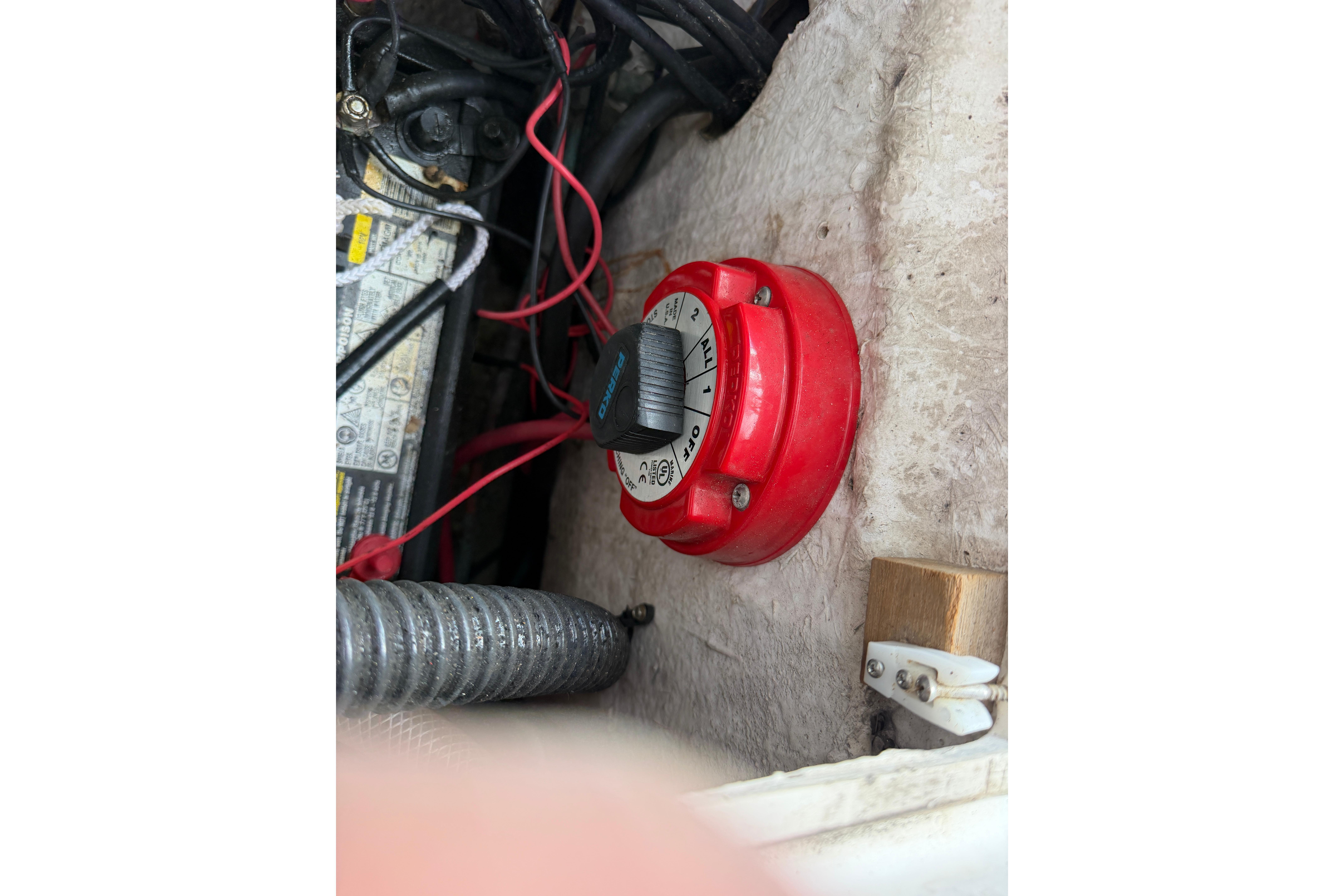Battery switch and wiring inside a 1987 Grady-White Seafarer 226 boat.
