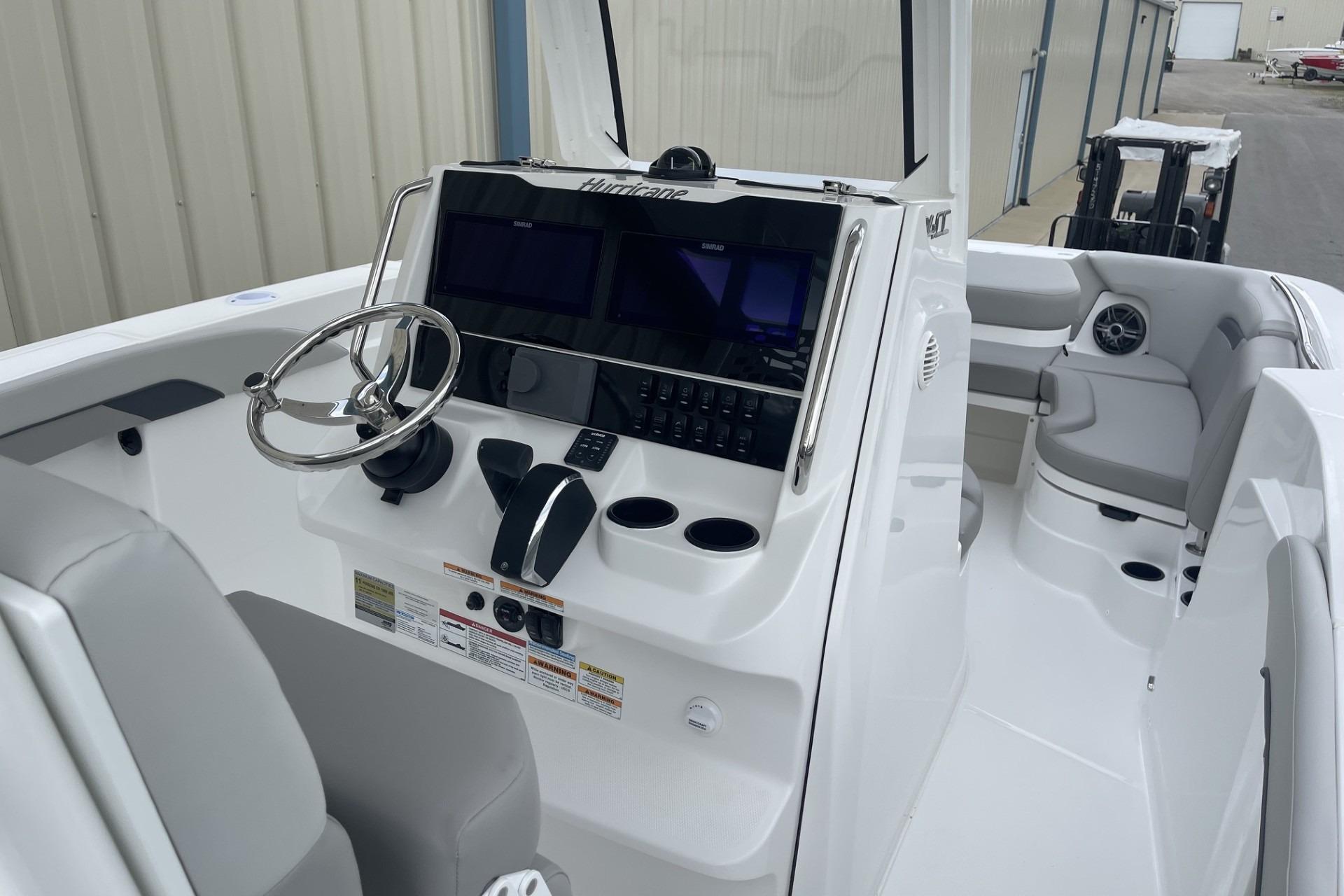 2026 Hurricane Center Console 24 OB boat interior with modern helm and seating.