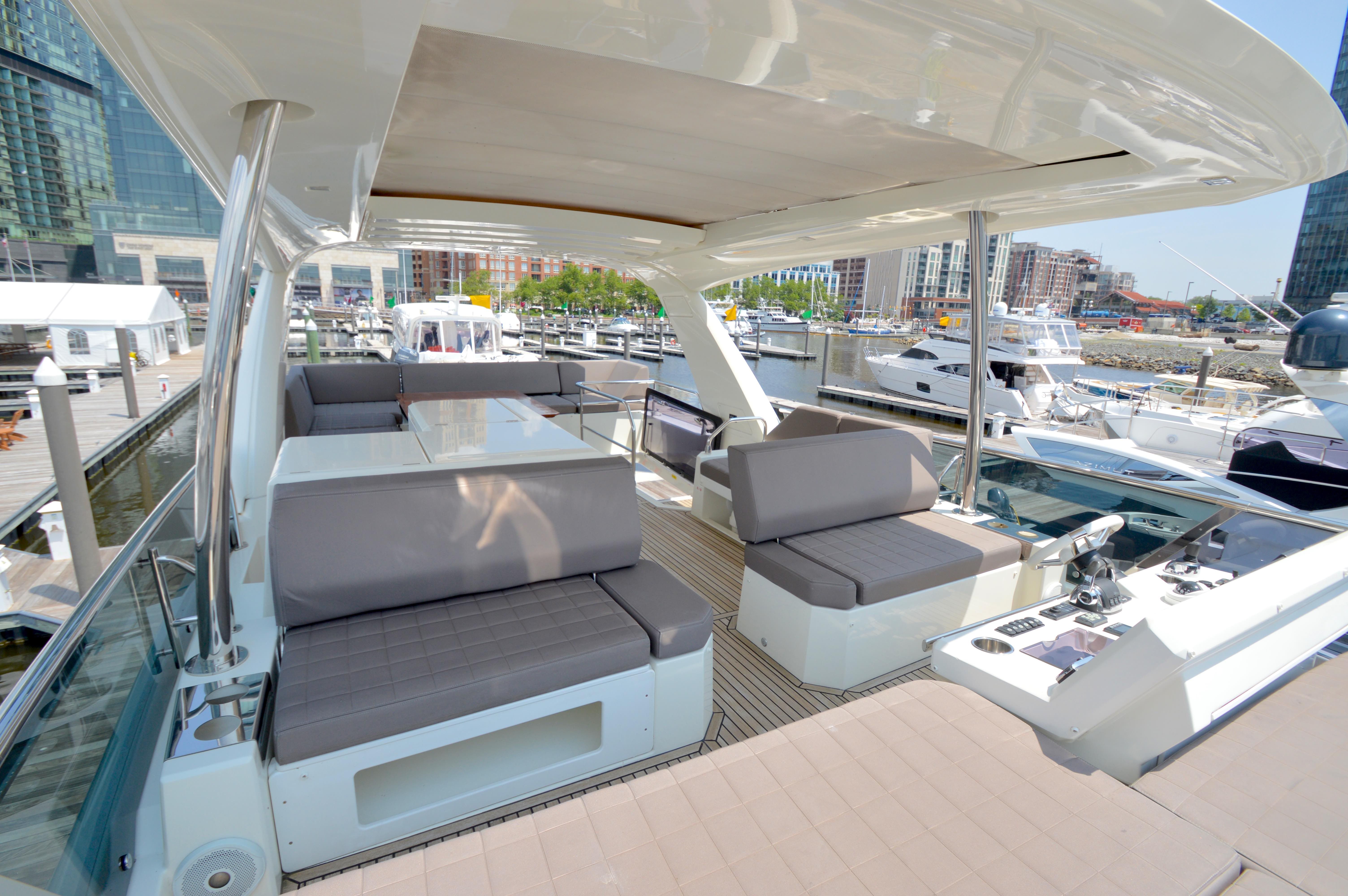 Luxurious interior of Prestige 630 yacht, 2017 model, docked at marina.