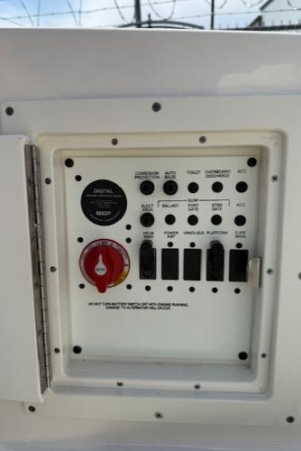 Control panel of 2023 Chaparral 267 SSX boat with switches and digital display.