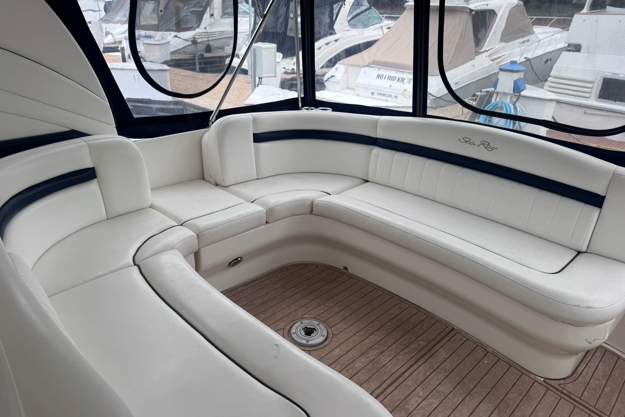 Luxurious seating area on a 2004 Sea Ray 390 Sundancer yacht.