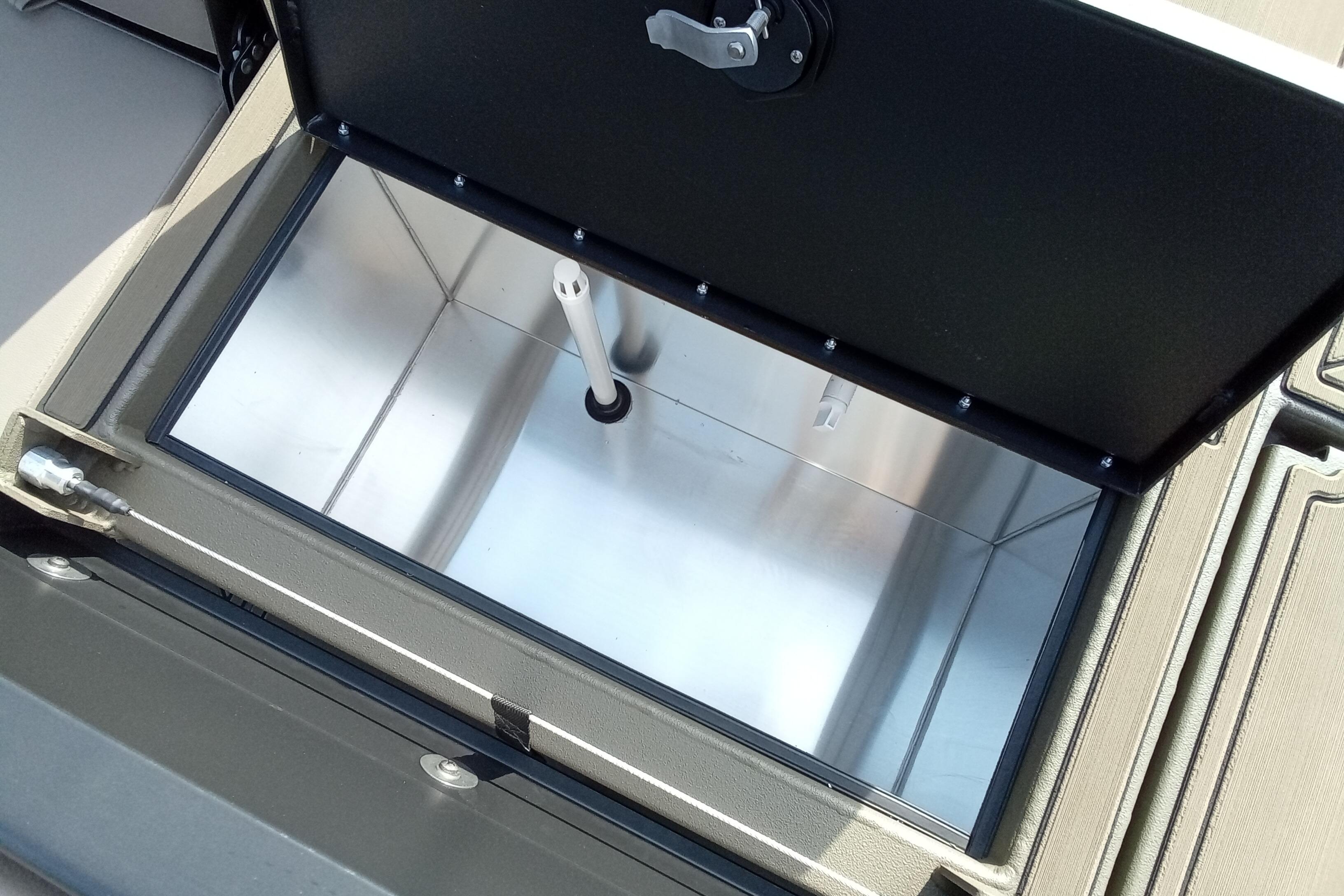 Open storage compartment in 2026 Thor 1900 Low Country Elite boat.