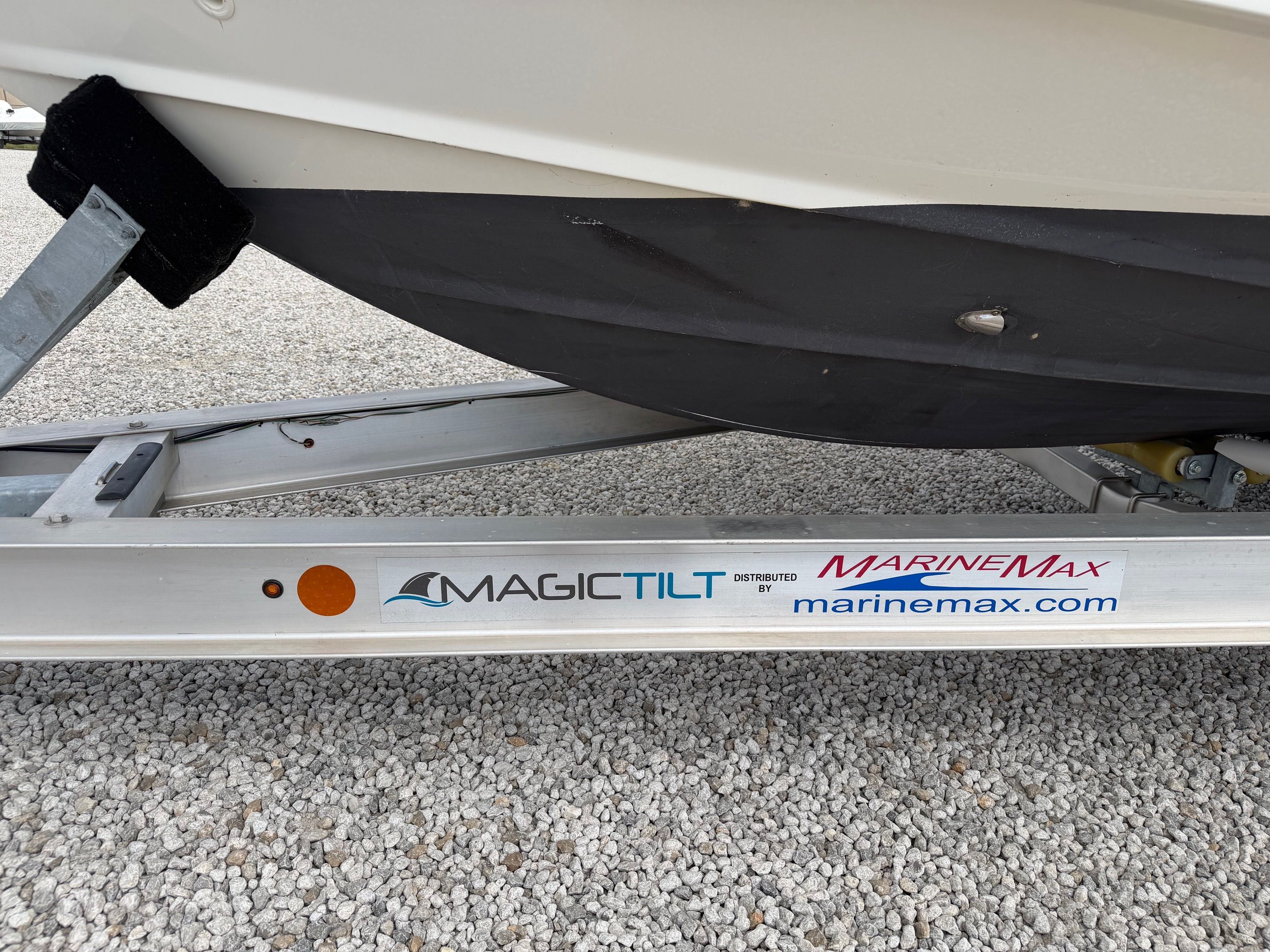 Boston Whaler 230 Outrage 2020 on Magic Tilt trailer.