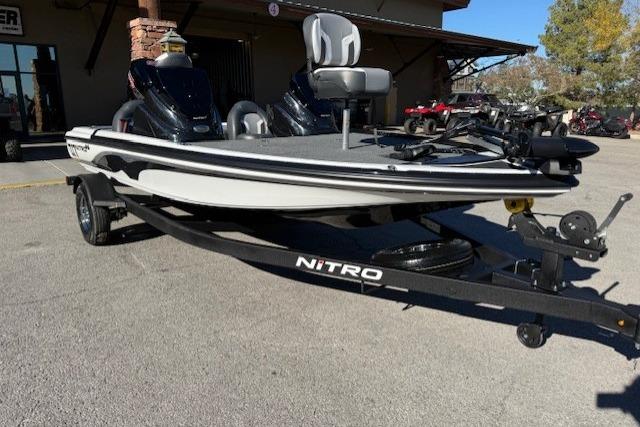 2026 Nitro Z17 fishing boat on trailer, parked outdoors.