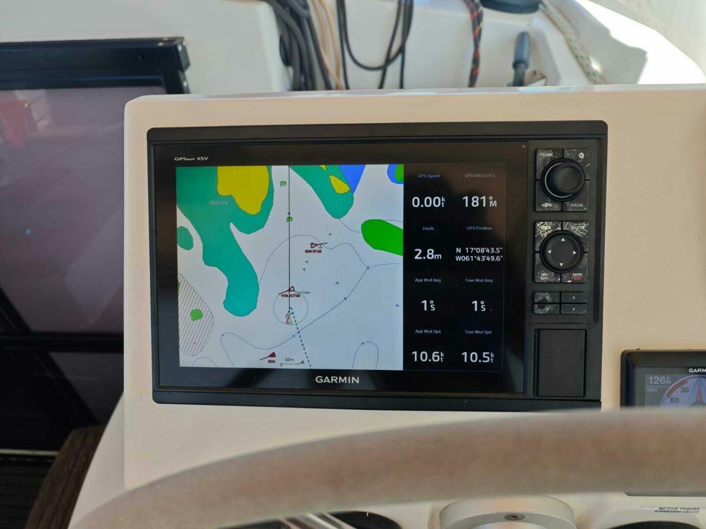 Garmin navigation display on 2020 Fountaine Pajot Astrea 42 catamaran, showing map and data.