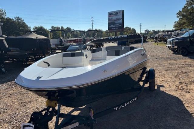 2026 Tahoe T16 boat on trailer in outdoor dealership lot.