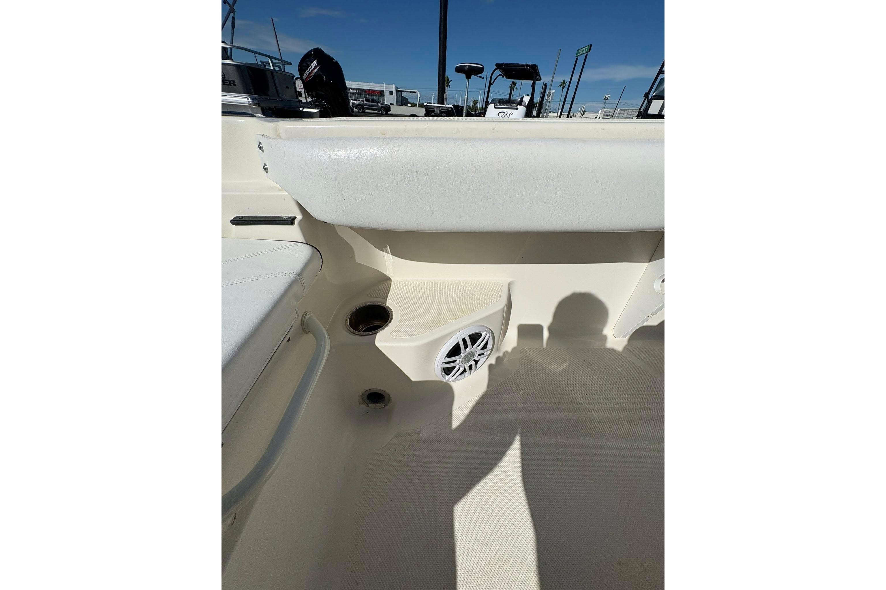 2023 Skeeter SX2550 Family boat interior with speaker and seating area.