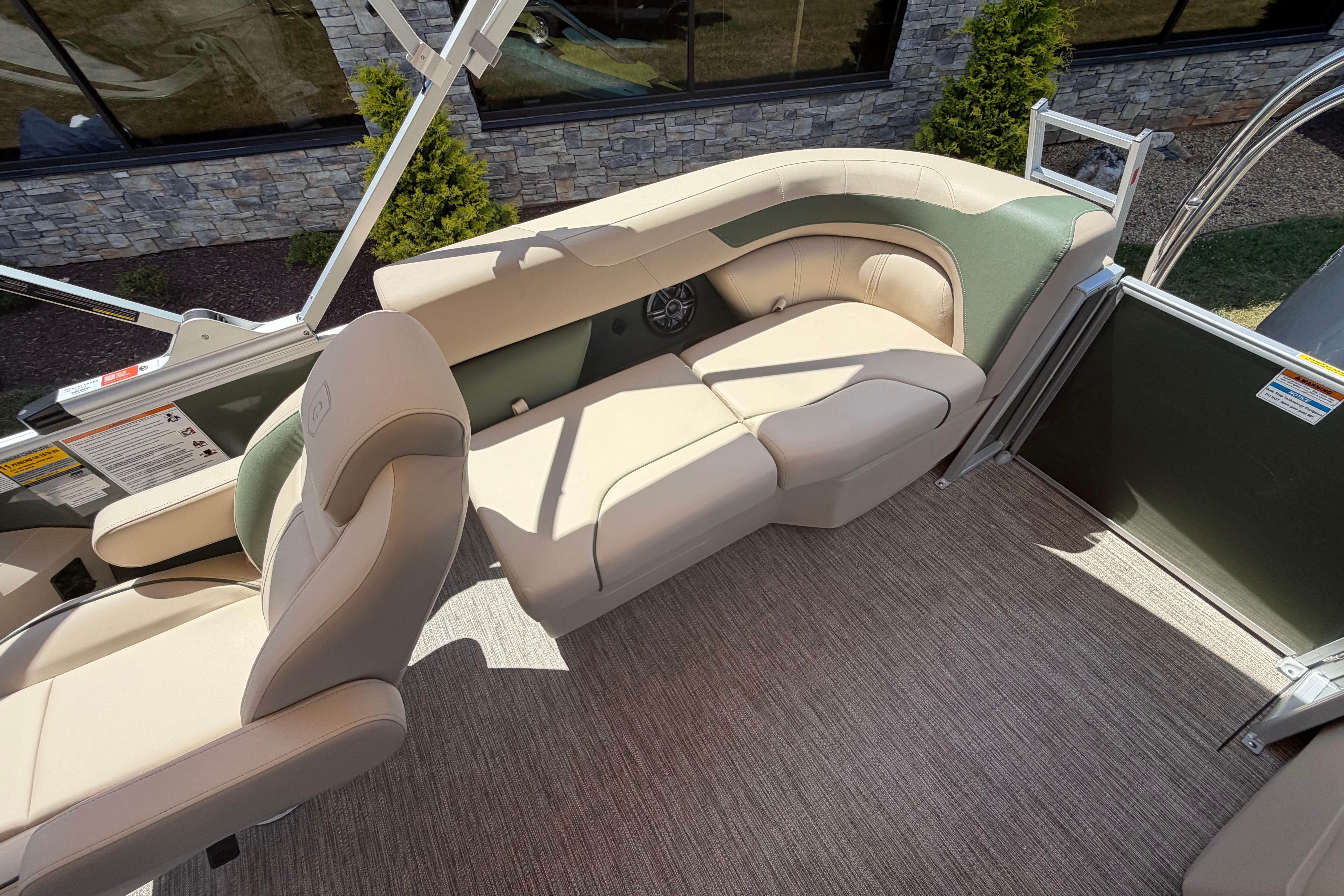 Luxurious seating on 2026 Godfrey SW 2086 SBC boat, featuring beige upholstery and modern design.