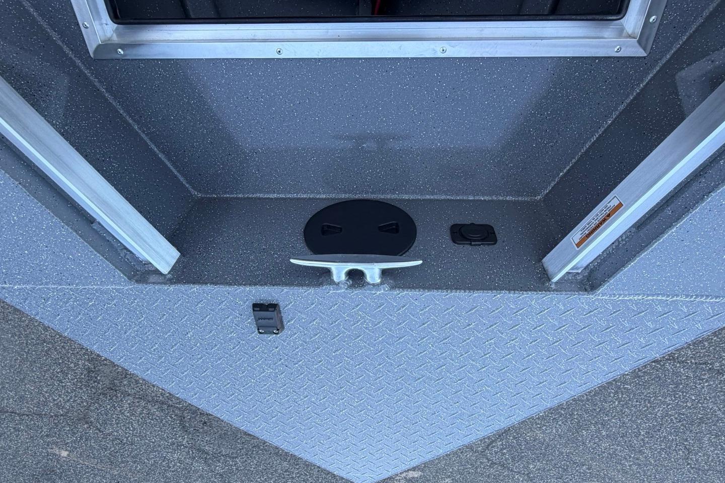 2026 Thunder Jet 209 Rush OT boat interior detail with textured flooring and hardware.