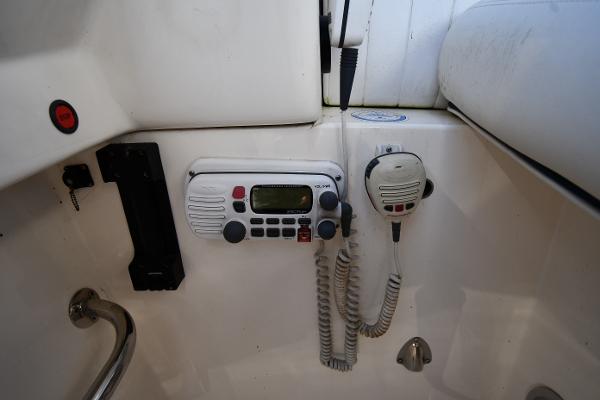 Radio equipment on a 1997 Sunseeker Camargue 47 yacht, featuring a control panel and microphone.