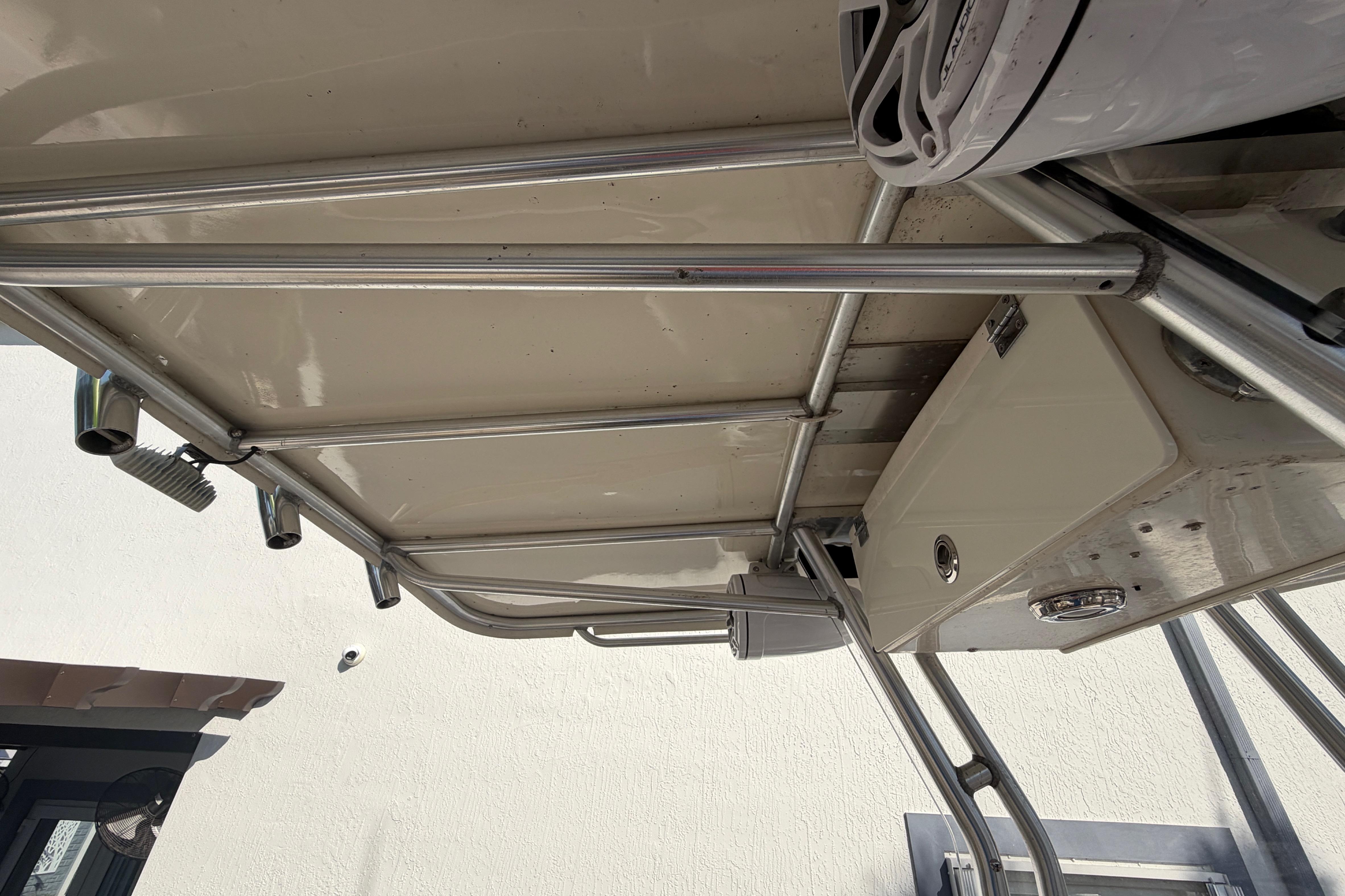 2004 Grady White 273 boat interior with metal framework and storage compartment.
