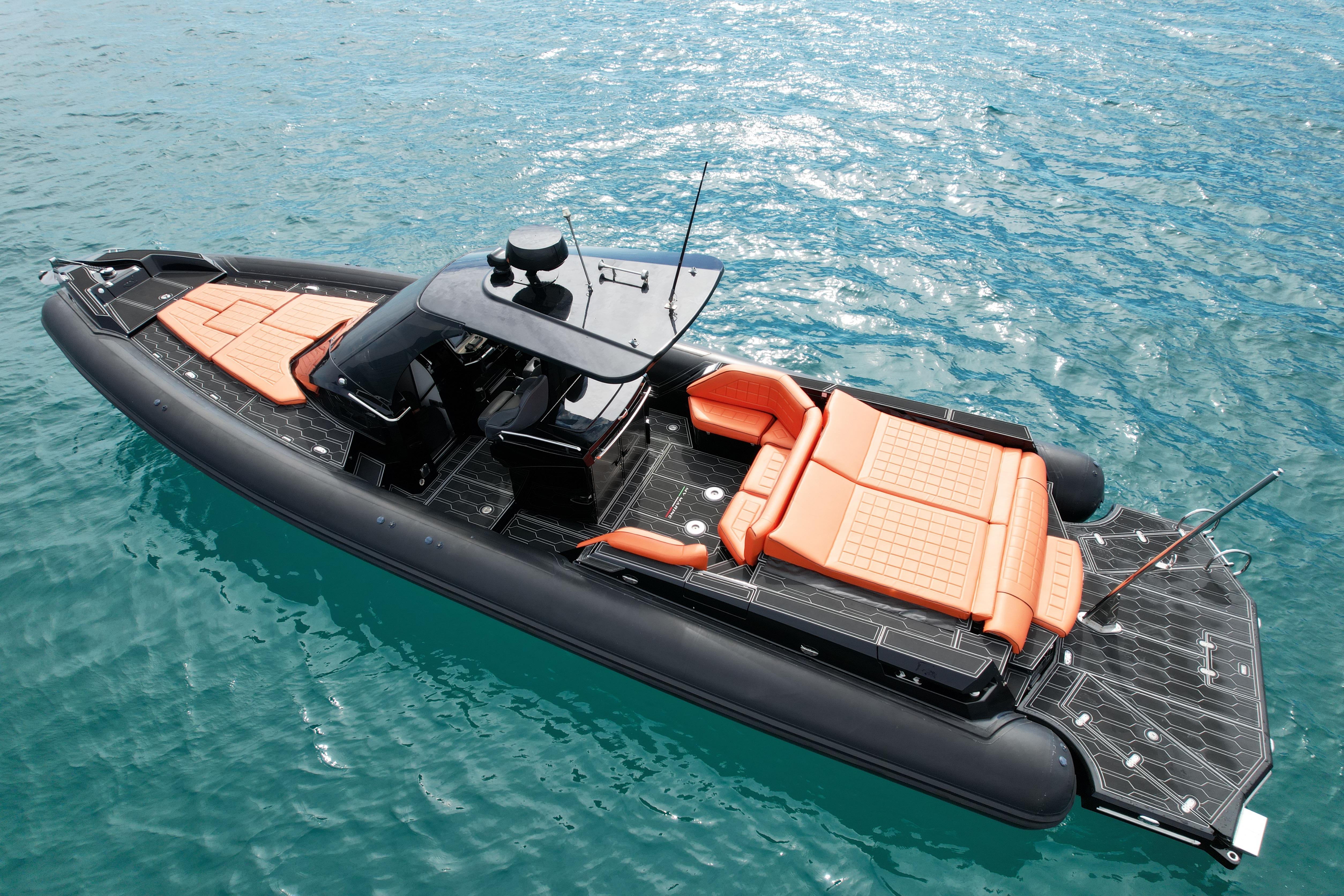 2017 MV Marine 40 boat with orange seating on blue water.