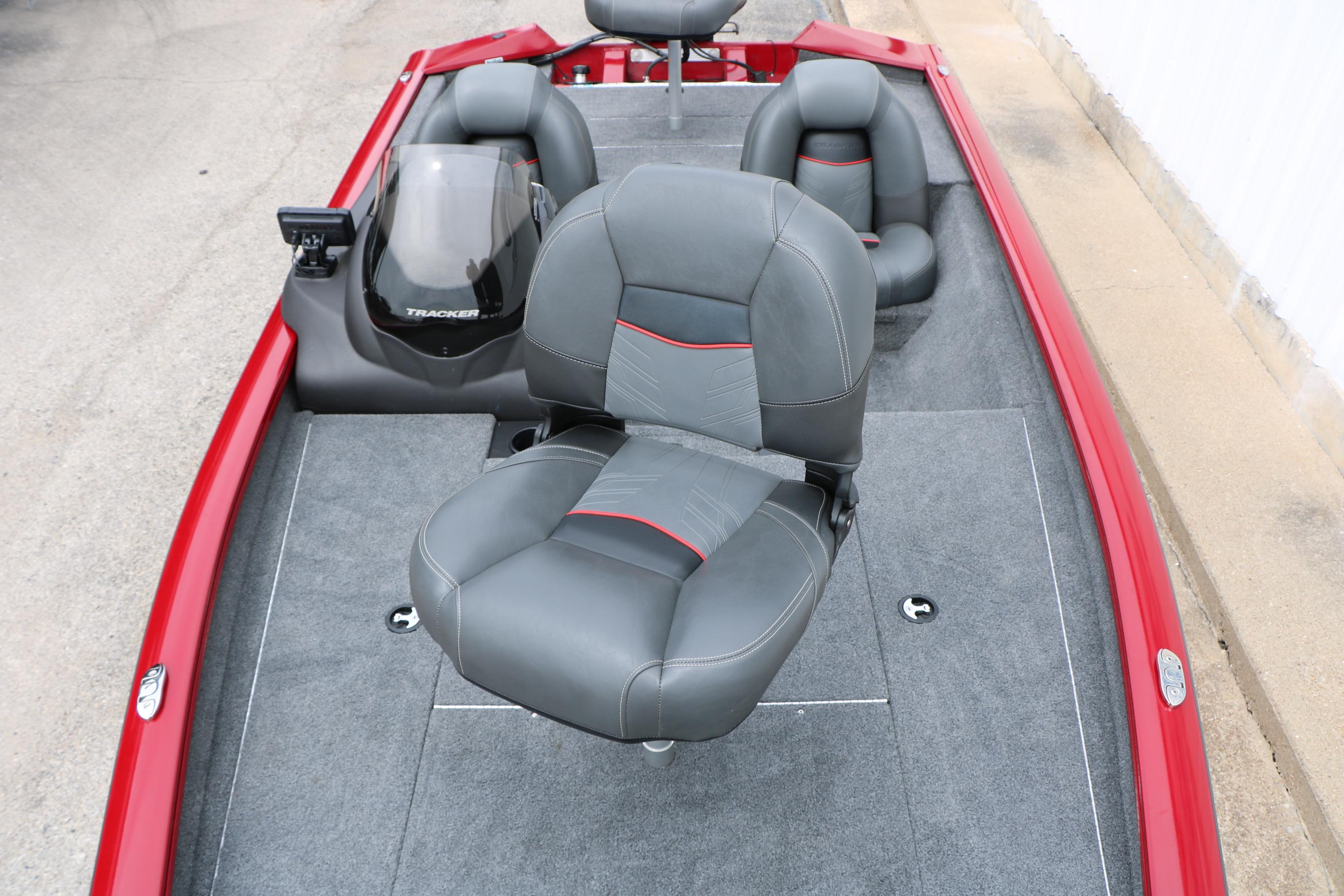 2024 Tracker Pro Team 175 boat interior with gray seats and red accents.