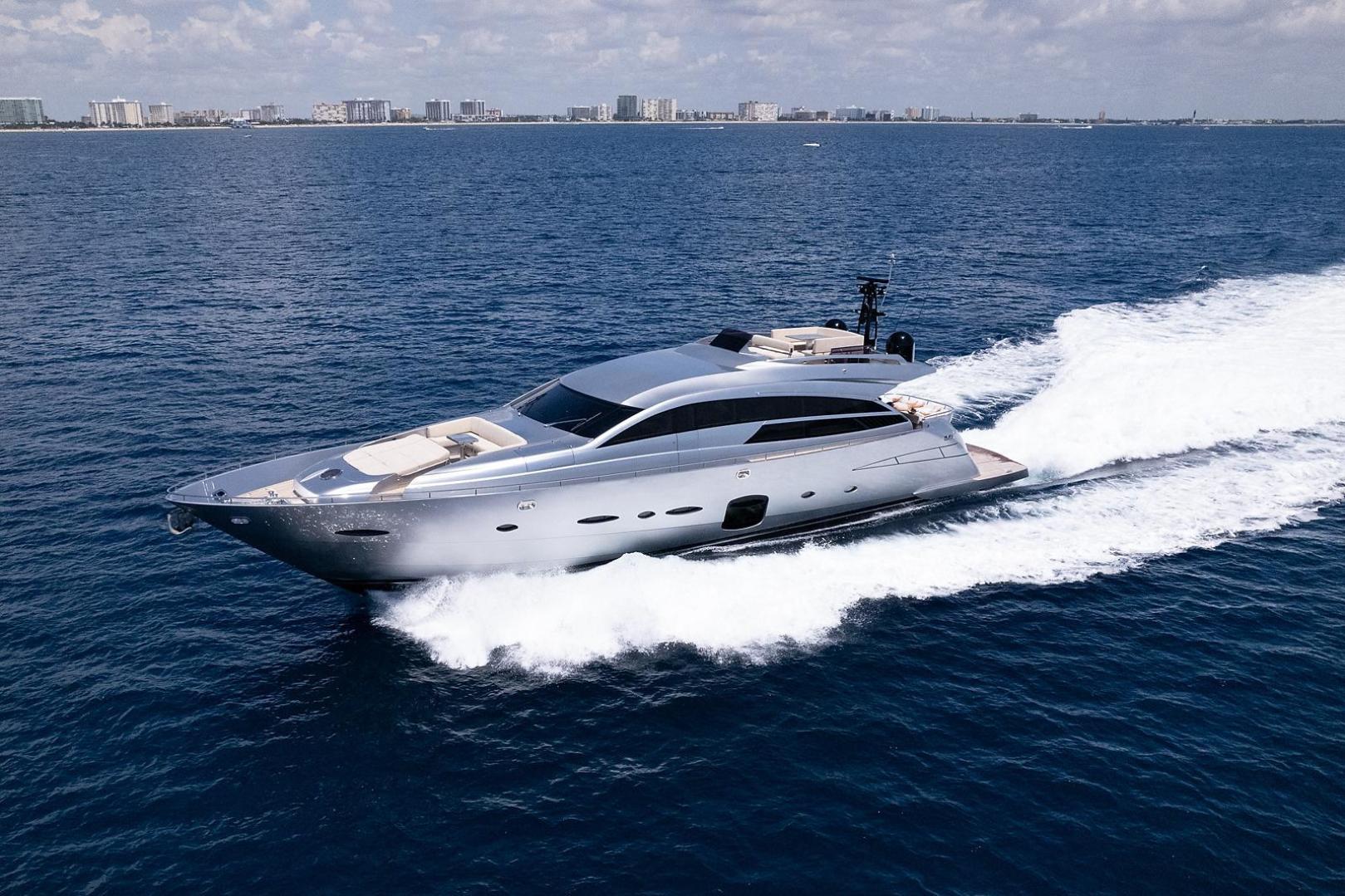 Luxury 2015 Pershing 92 yacht cruising on open sea under clear skies.