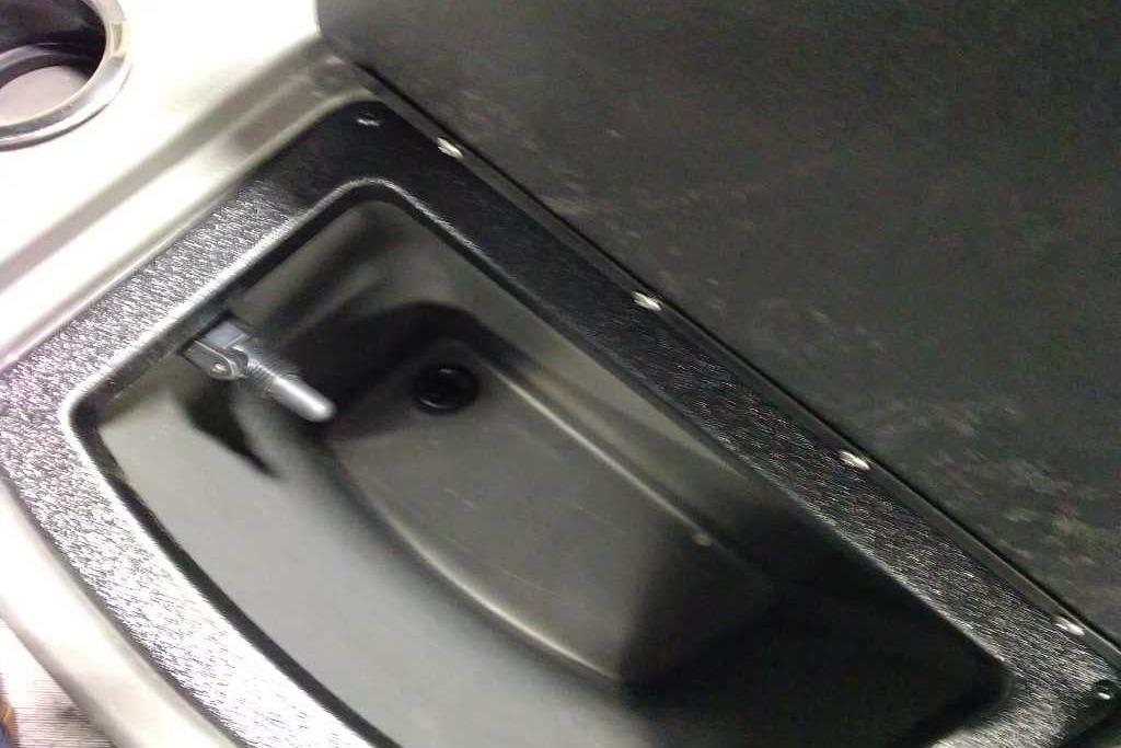Storage compartment of 2026 Sun Tracker Bass Buggy 18 DLX boat.